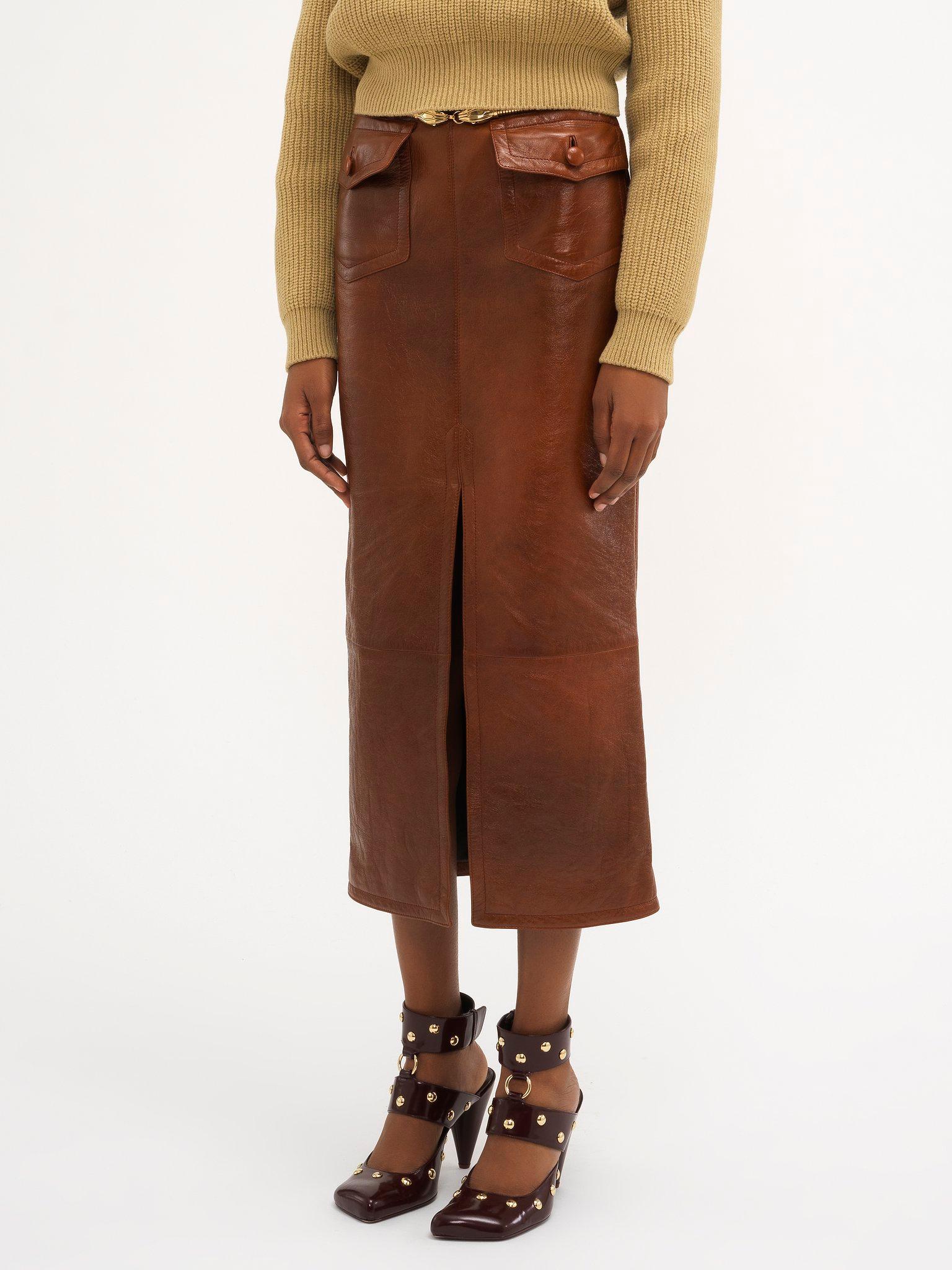 Front-slit midi skirt in glossy leather Product Image