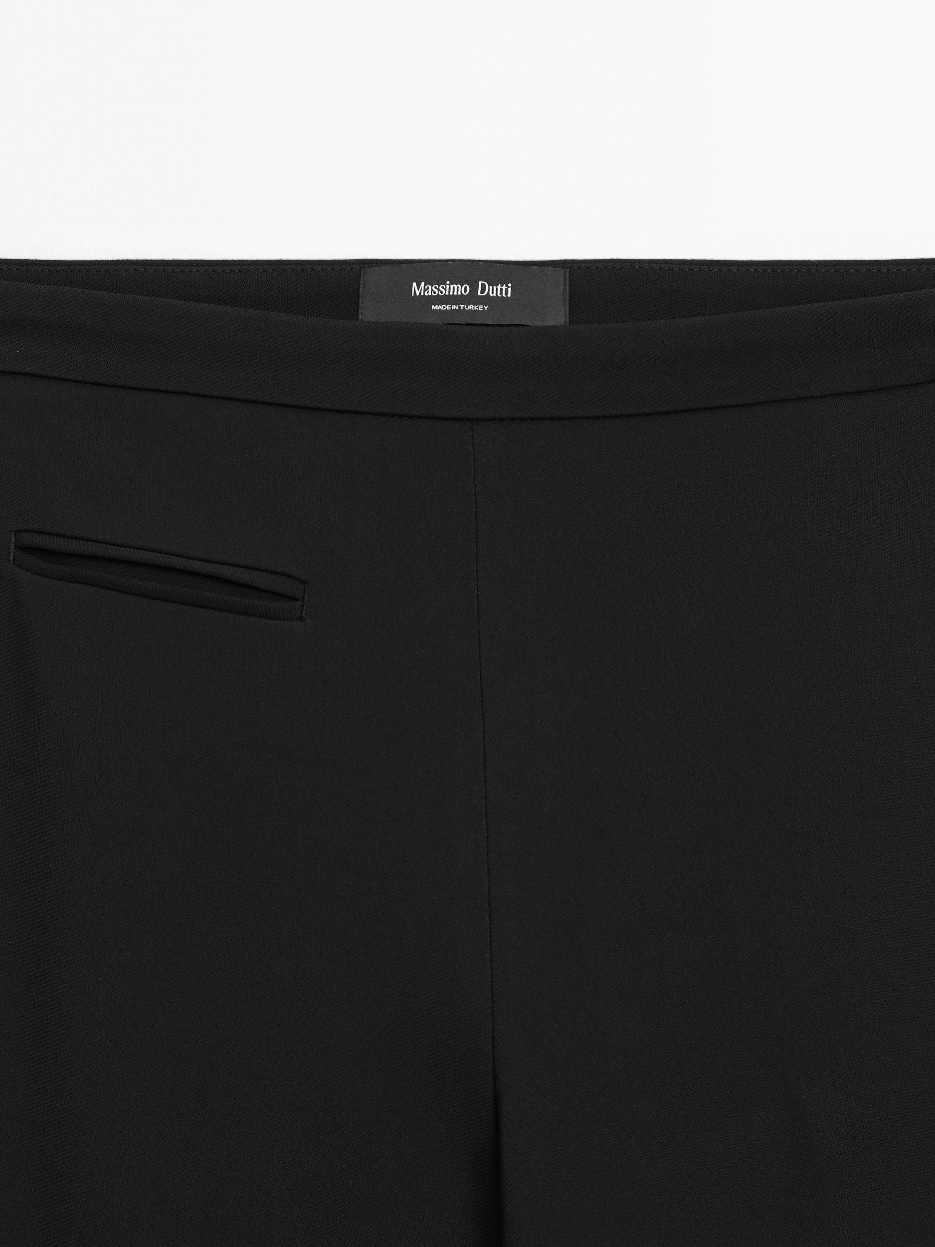 Flared trousers with pocket Product Image