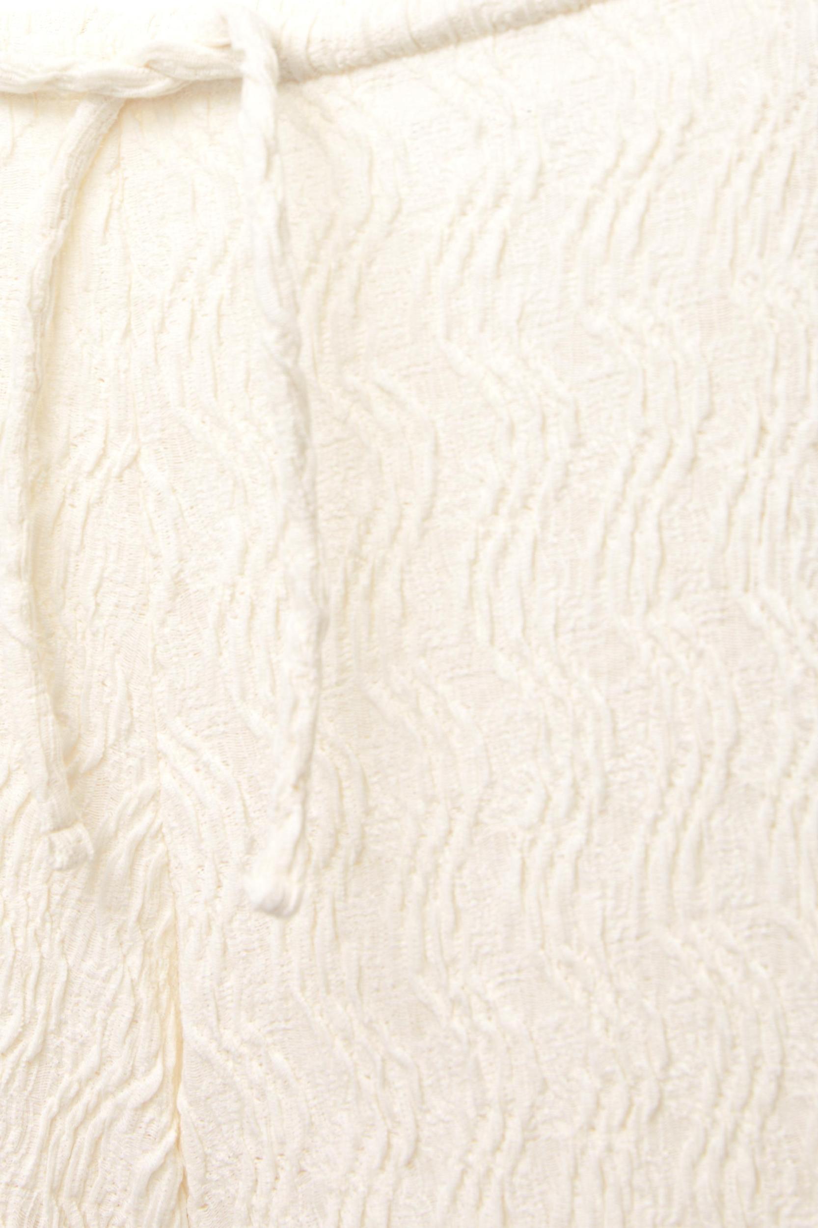 Textured loose-fitting pants Product Image