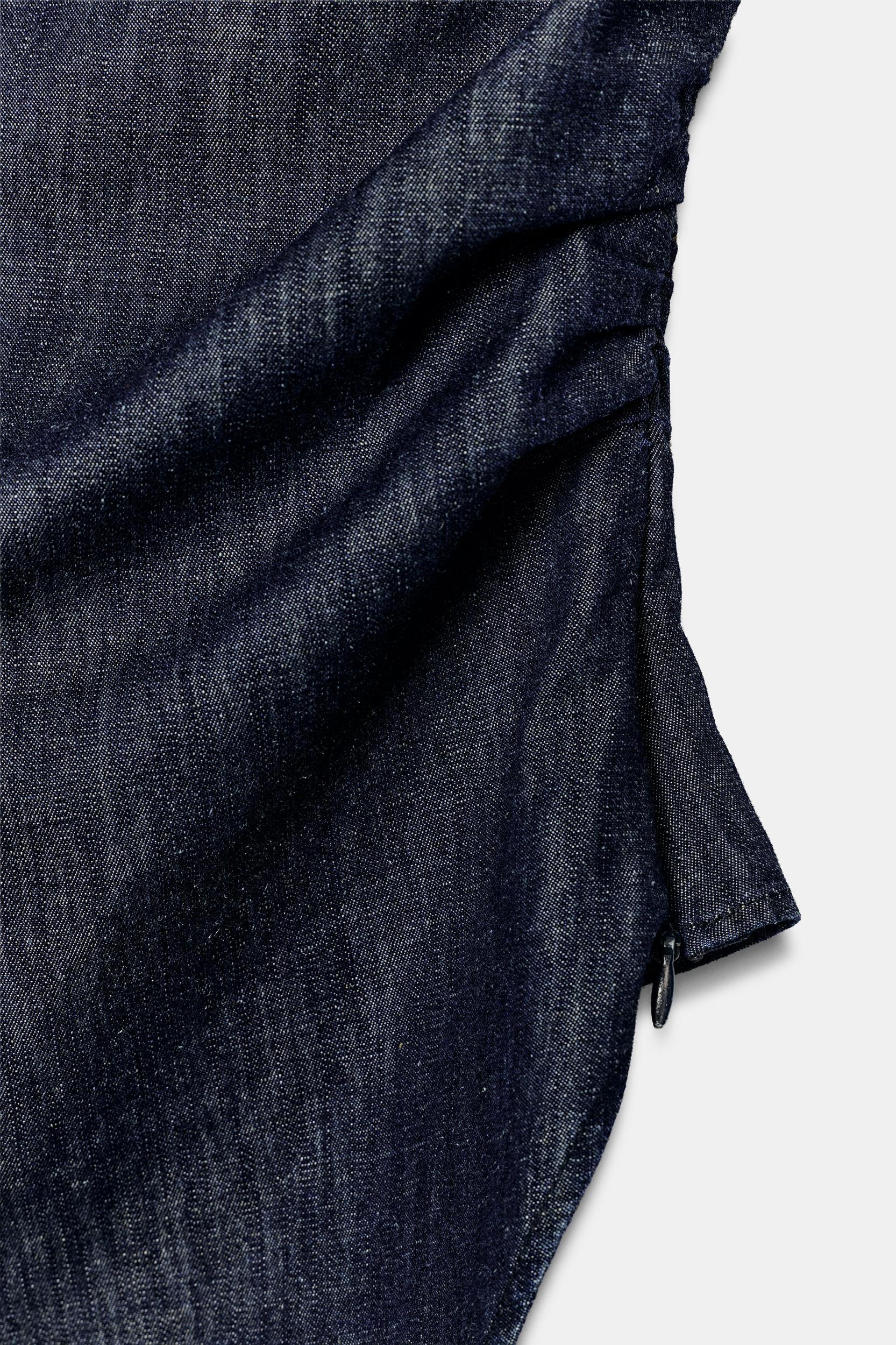 ASYMMETRIC SHOULDER PAD LINEN BLEND TOP Product Image