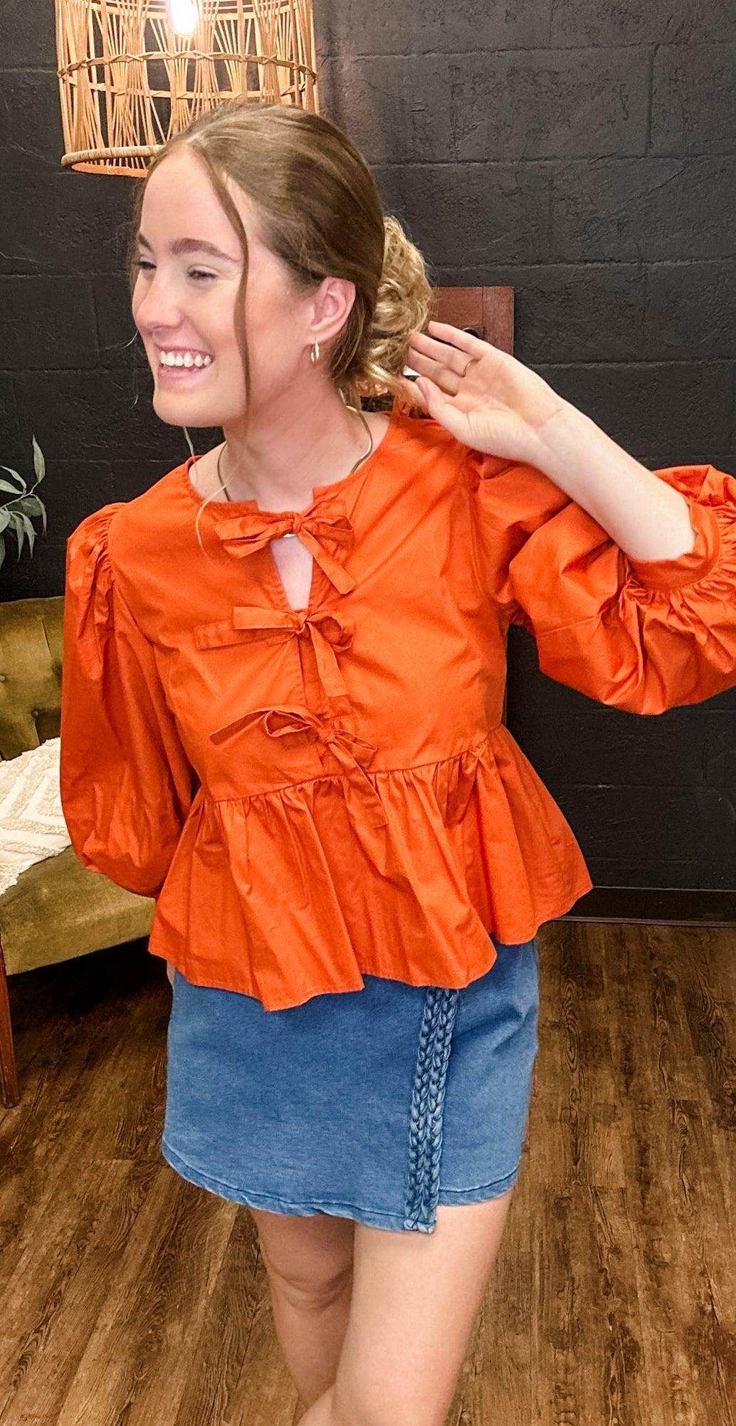 Take a Bow Rust Peplum 3/4 Sleeves Top (Small to XLarge) Product Image