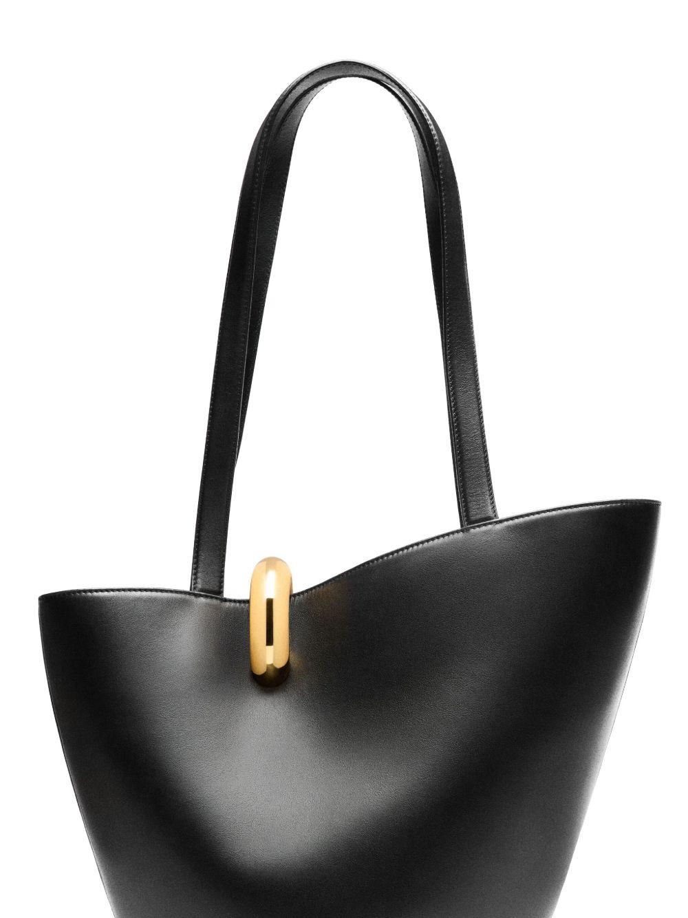 JACQUEMUS The Medium Bambola Asymmetric Leather Bucket Bag In Black 990 Product Image
