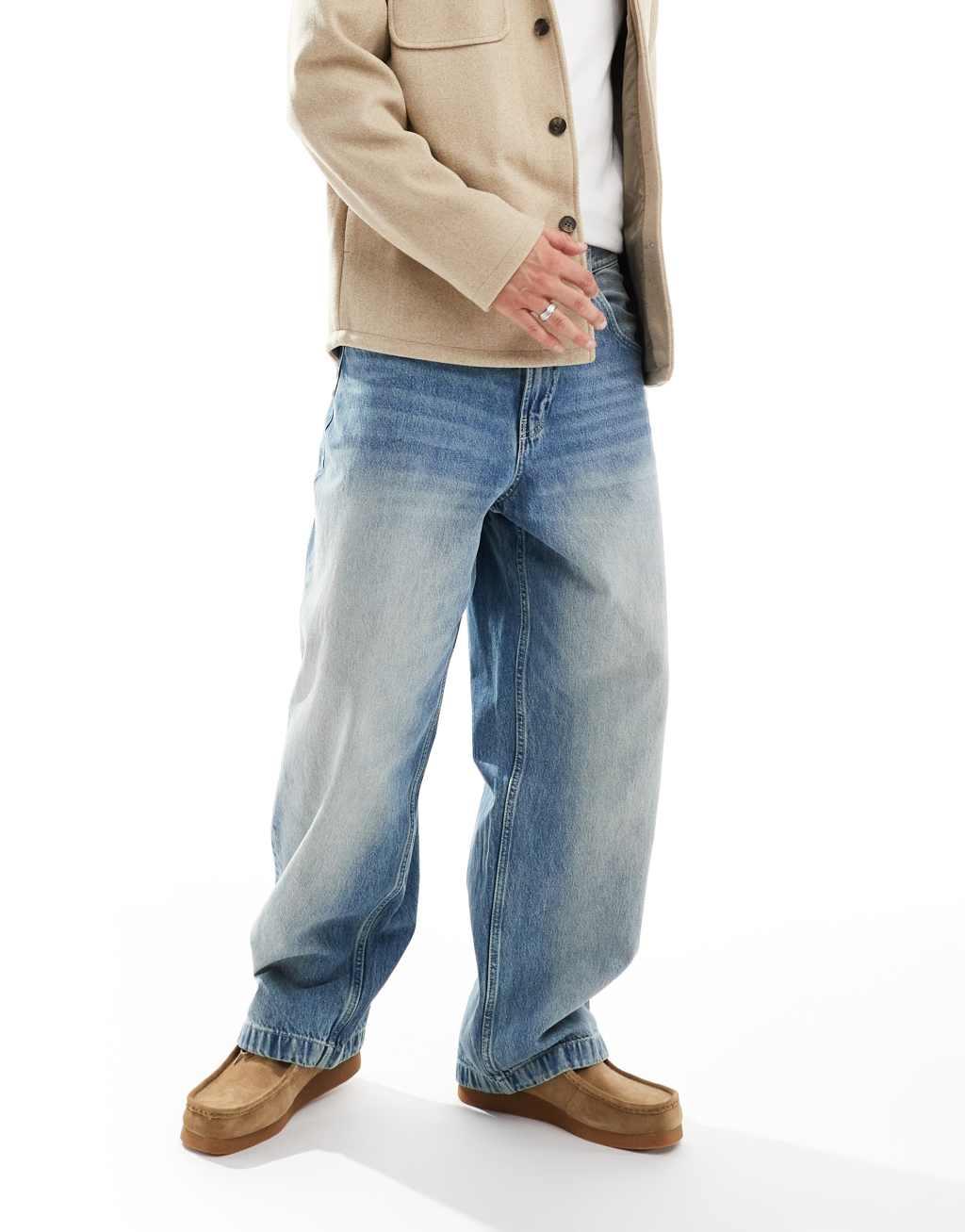 Bershka super baggy fit jeans in washed blue Product Image