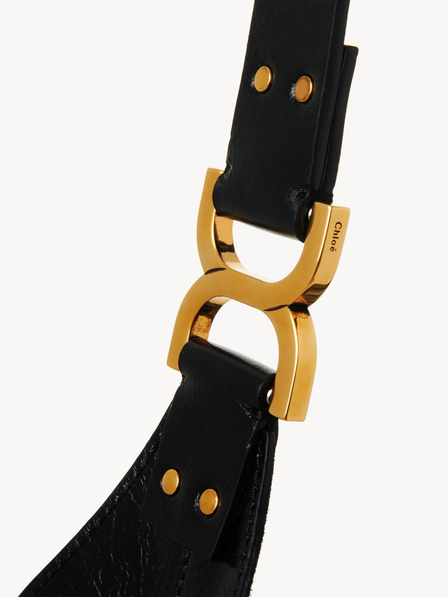 Small Marcie hobo bag in shiny leather Product Image