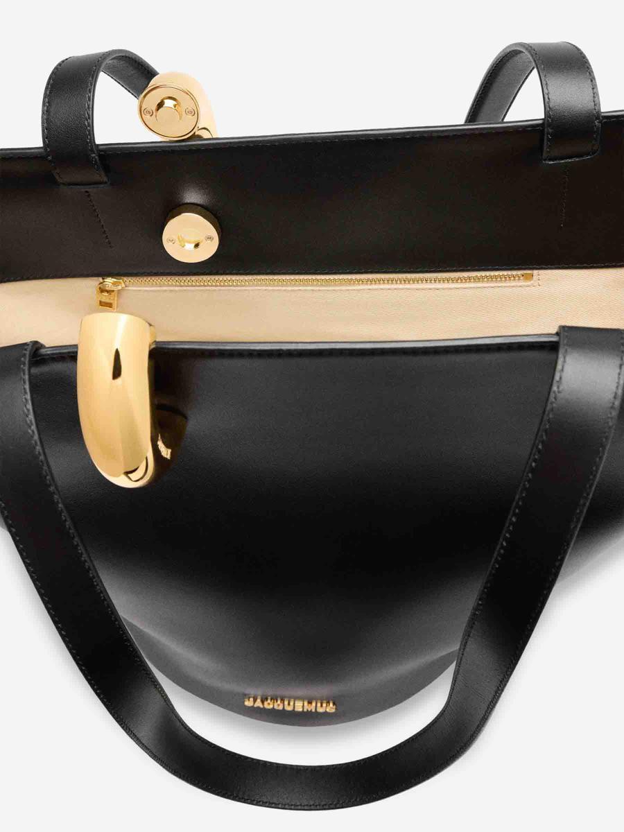 JACQUEMUS The Medium Bambola Asymmetric Leather Bucket Bag In Black 990 Product Image