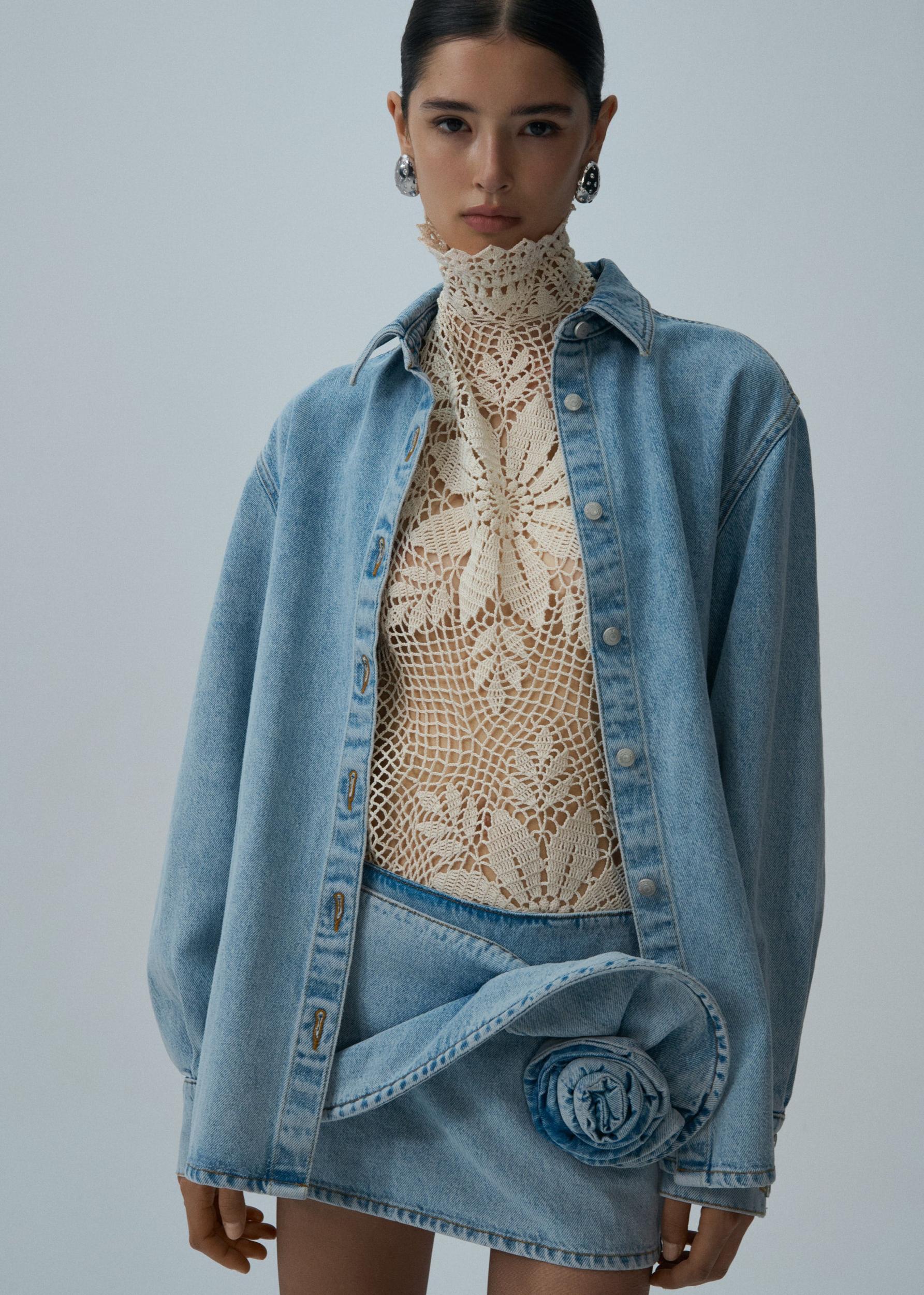 Floral appliqué denim mini skirt in light blue Product Image