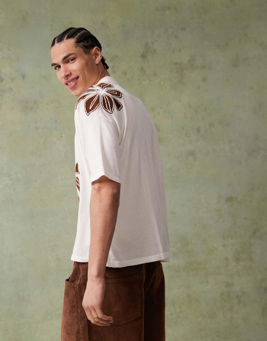 ASOS DESIGN relaxed boxy fit knit button down polo shirt with floral embroidery in ecru Product Image