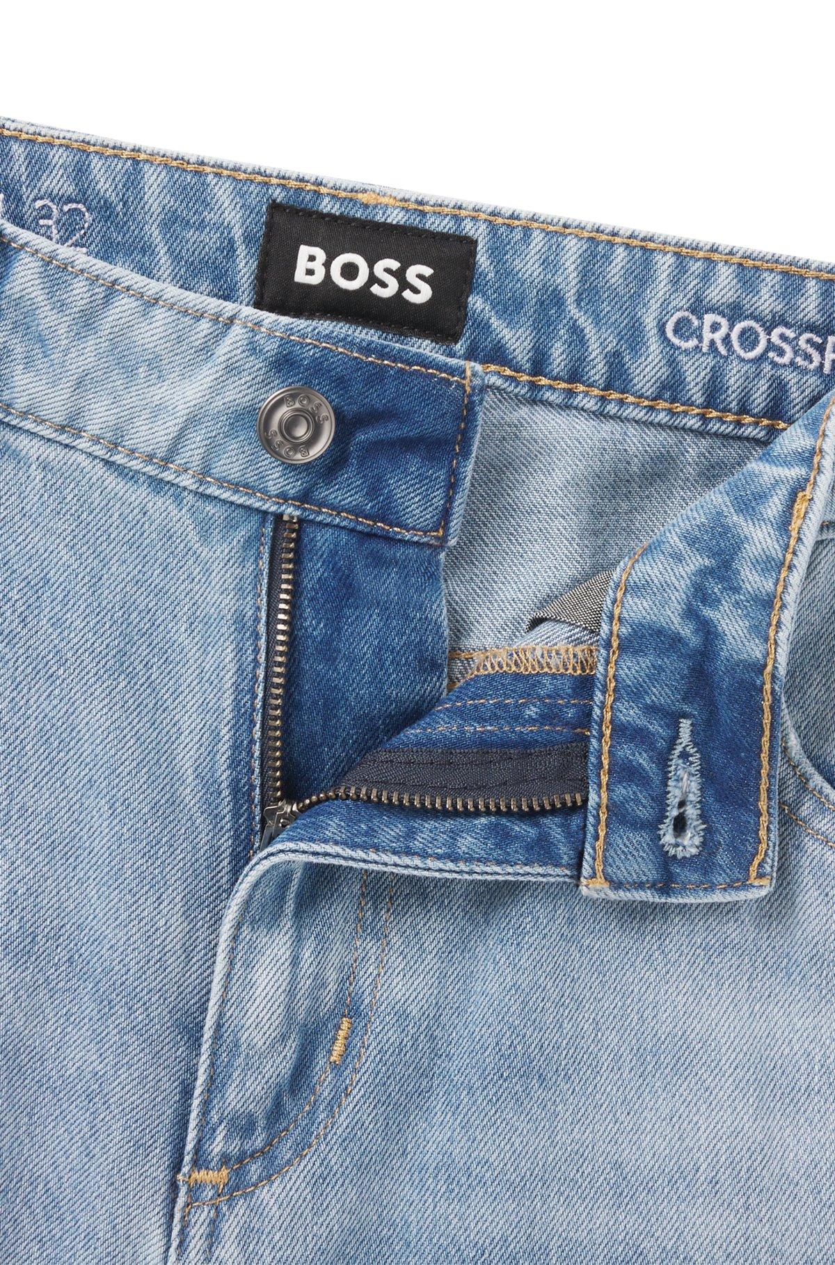 Wide-leg jeans in blue denim with stepped hem Product Image