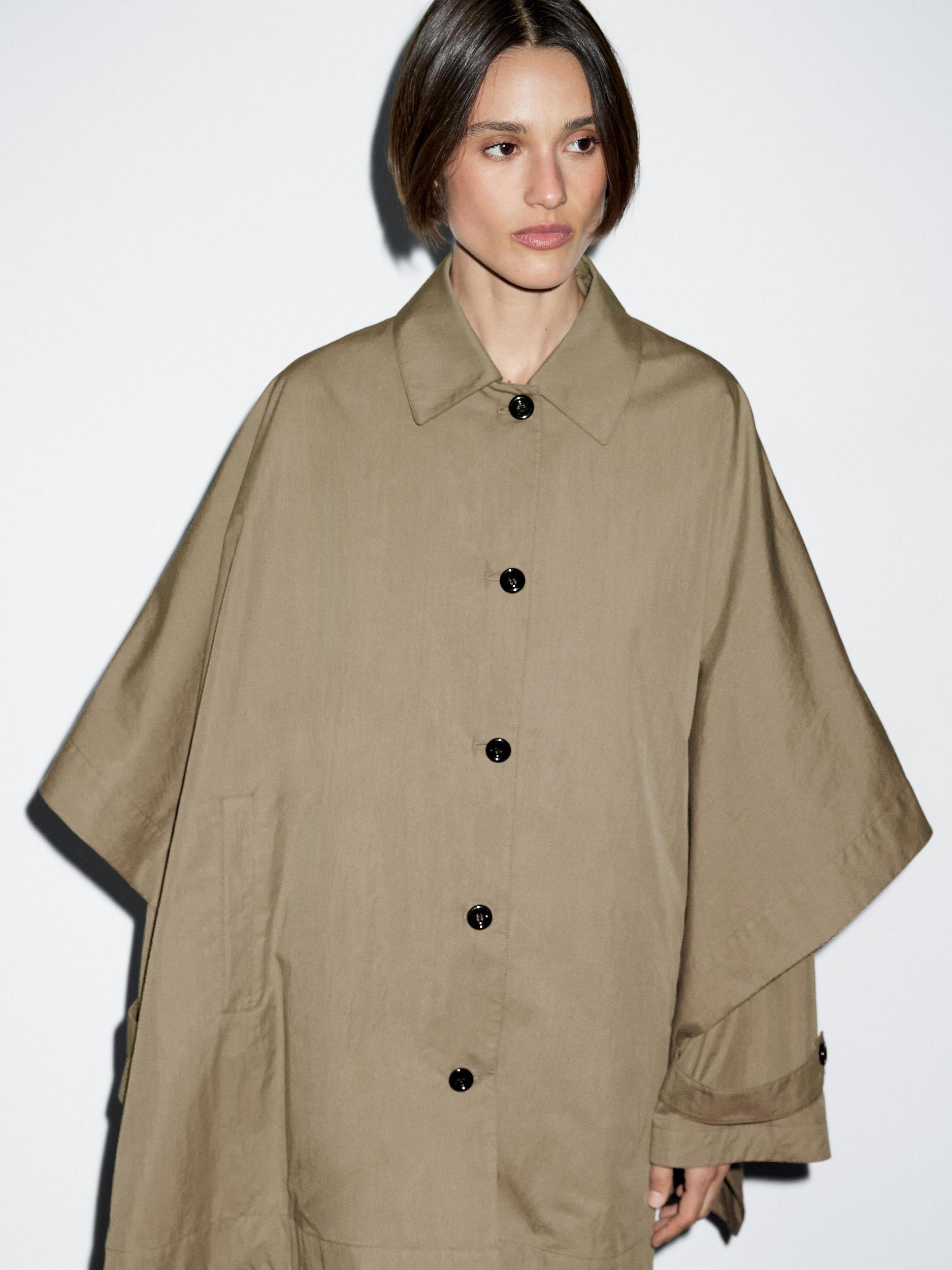 Cape trench coat with long sleeves Product Image