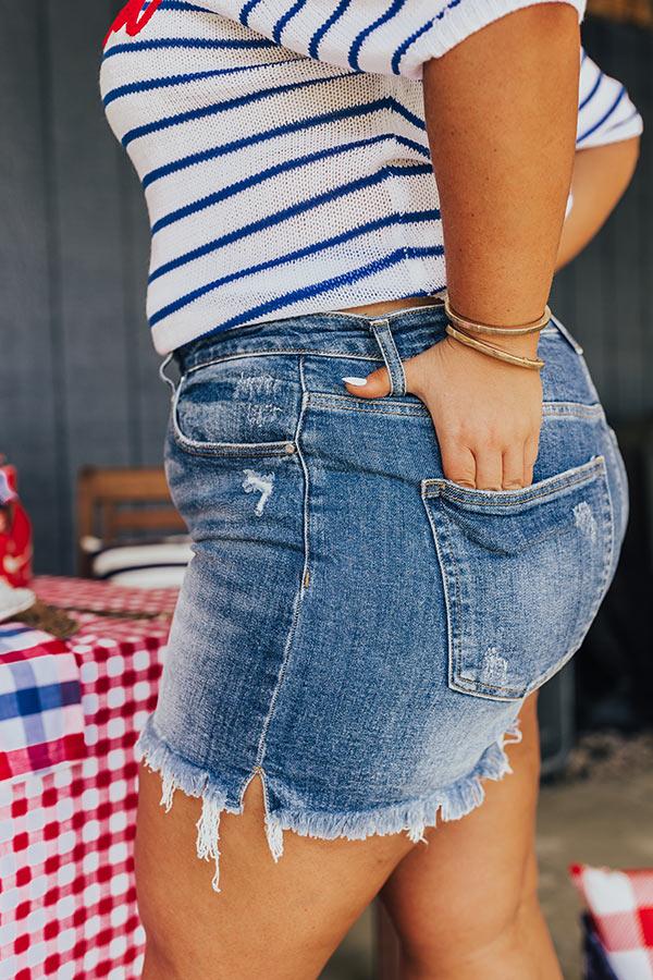 Risen Maeve High Waist Frayed Shorts in Medium Wash Curves Product Image