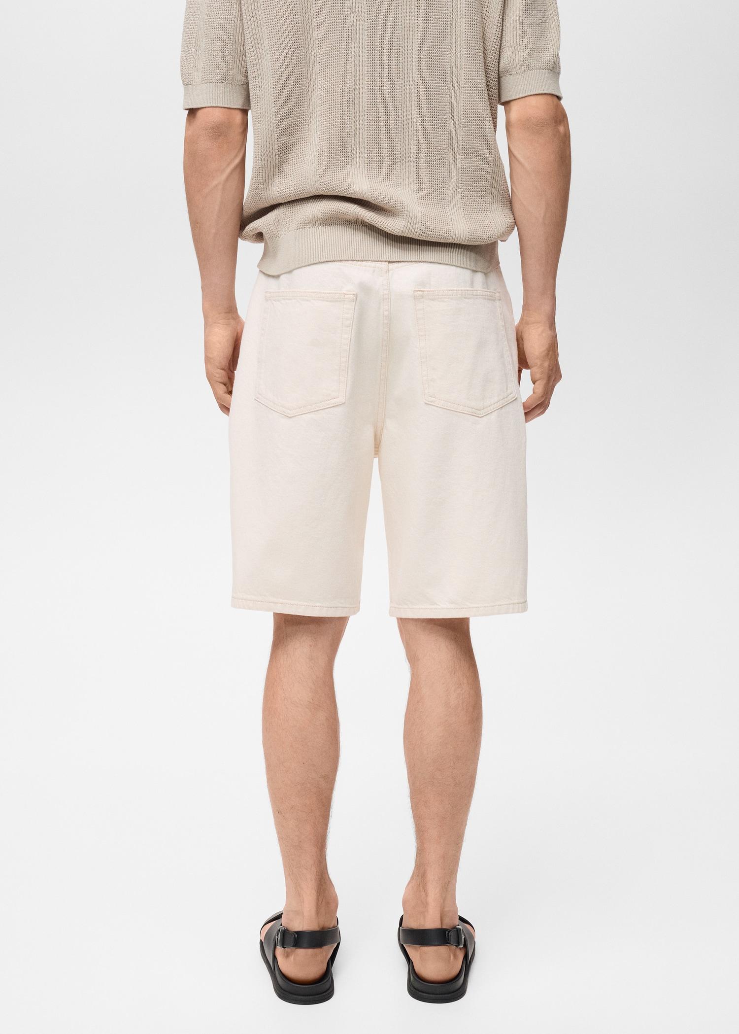 Denim relaxed-fit bermuda shorts - Men | MANGO USA Product Image