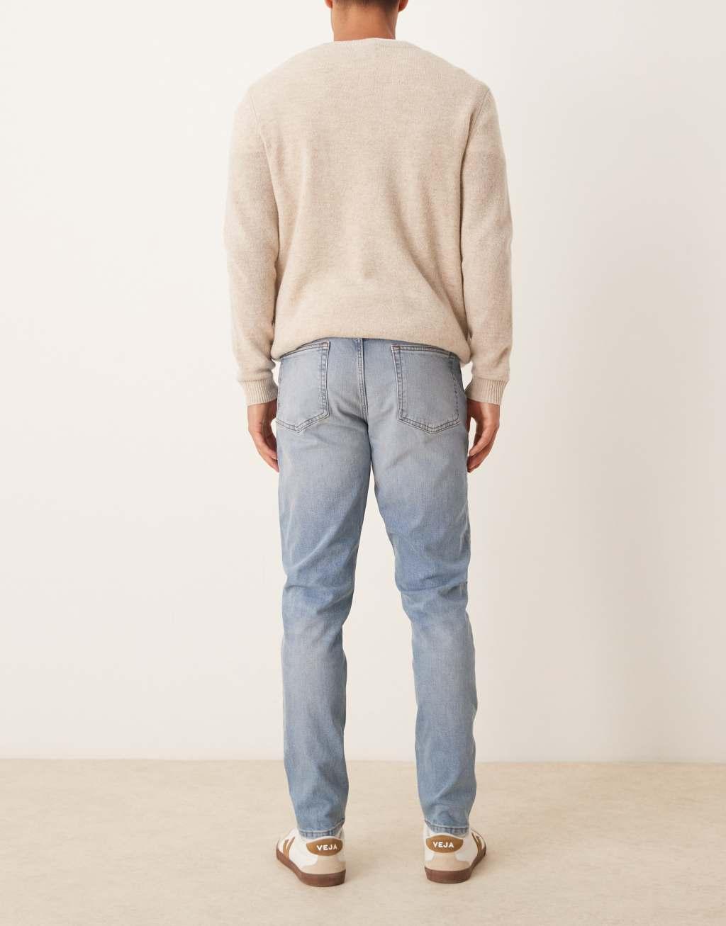 ASOS DESIGN skinny jeans in light wash blue Product Image