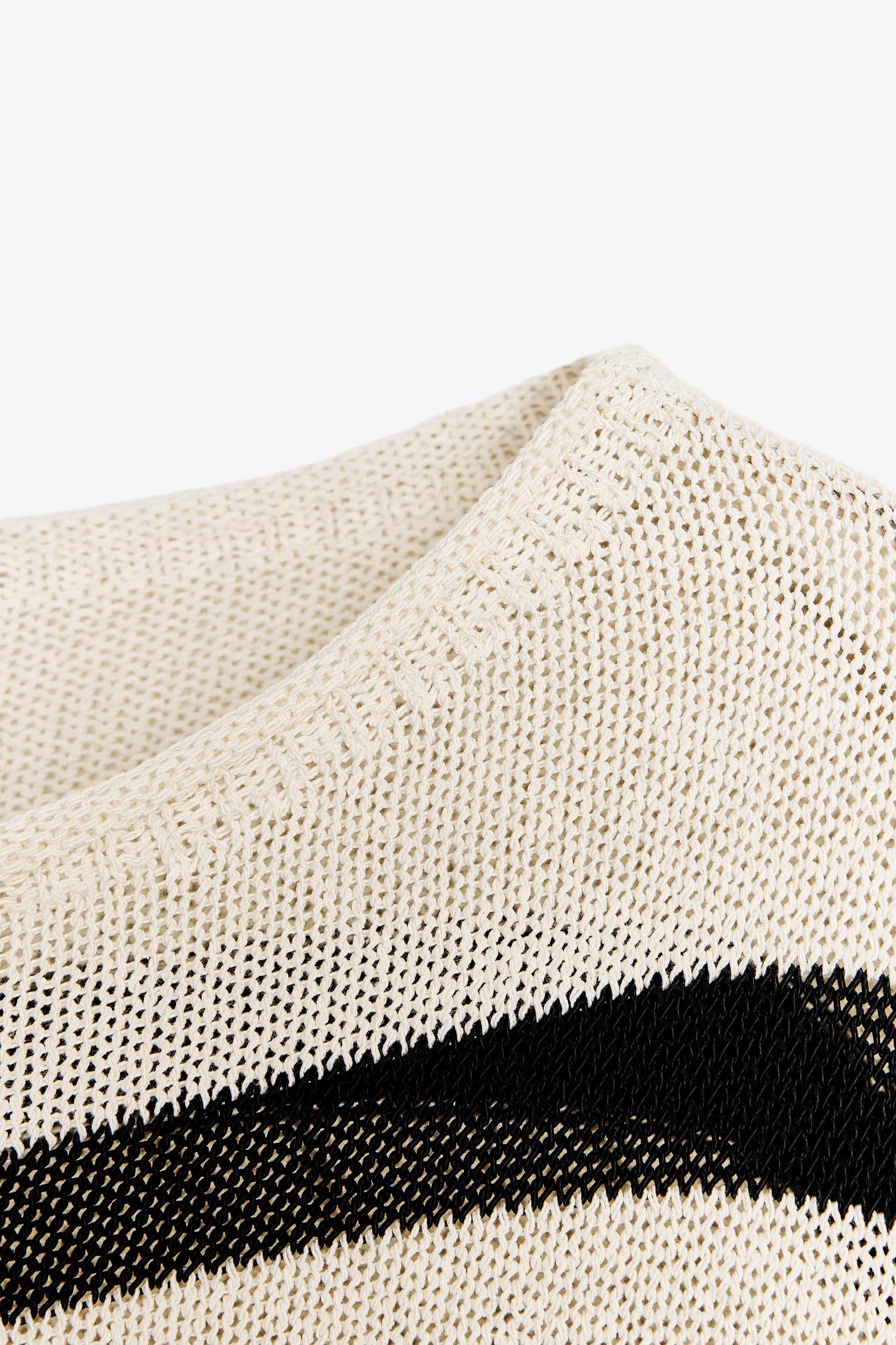 STRIPED KNIT SWEATER Product Image