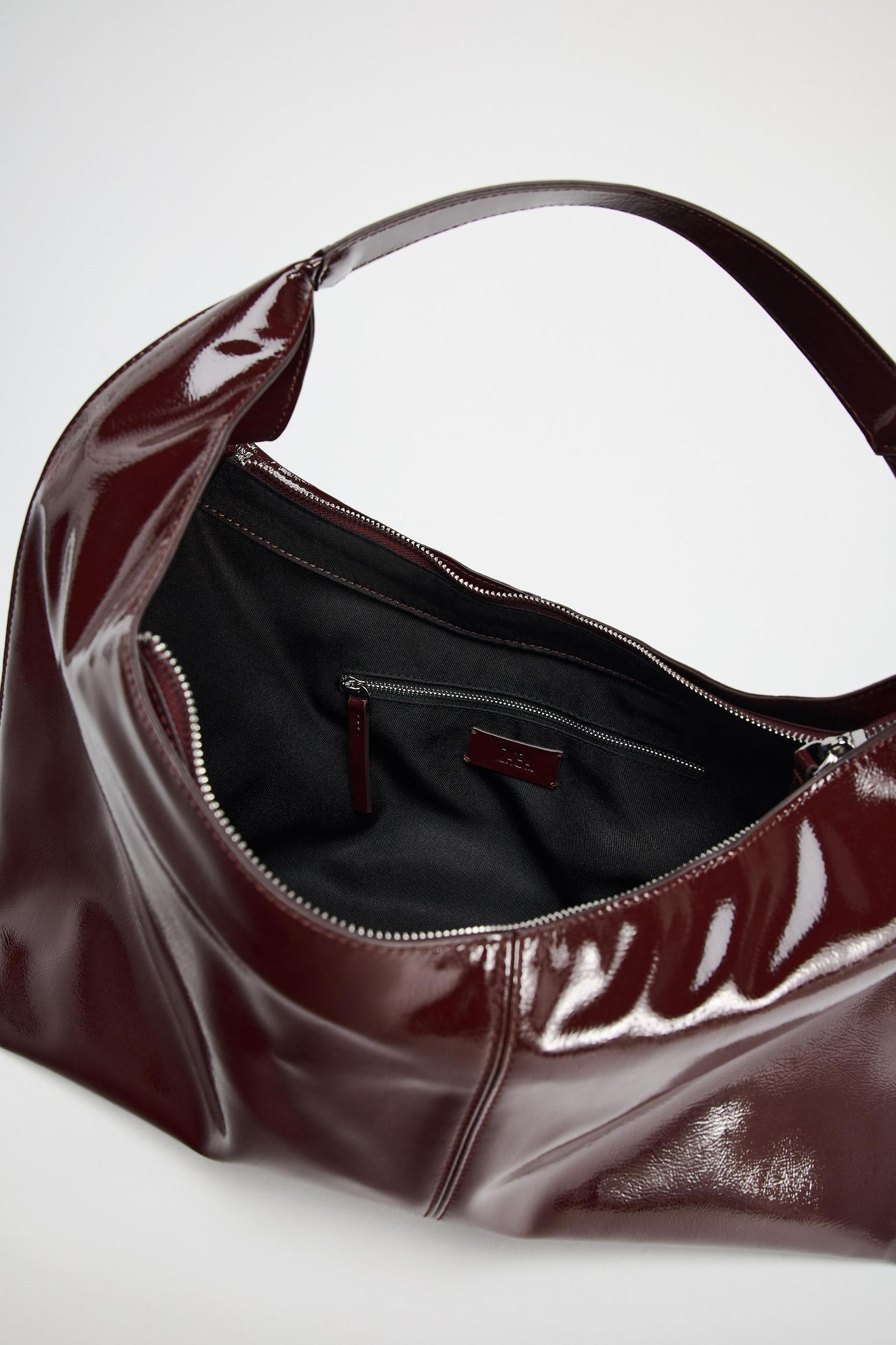 PATENT FINISH BUCKET BAG Product Image