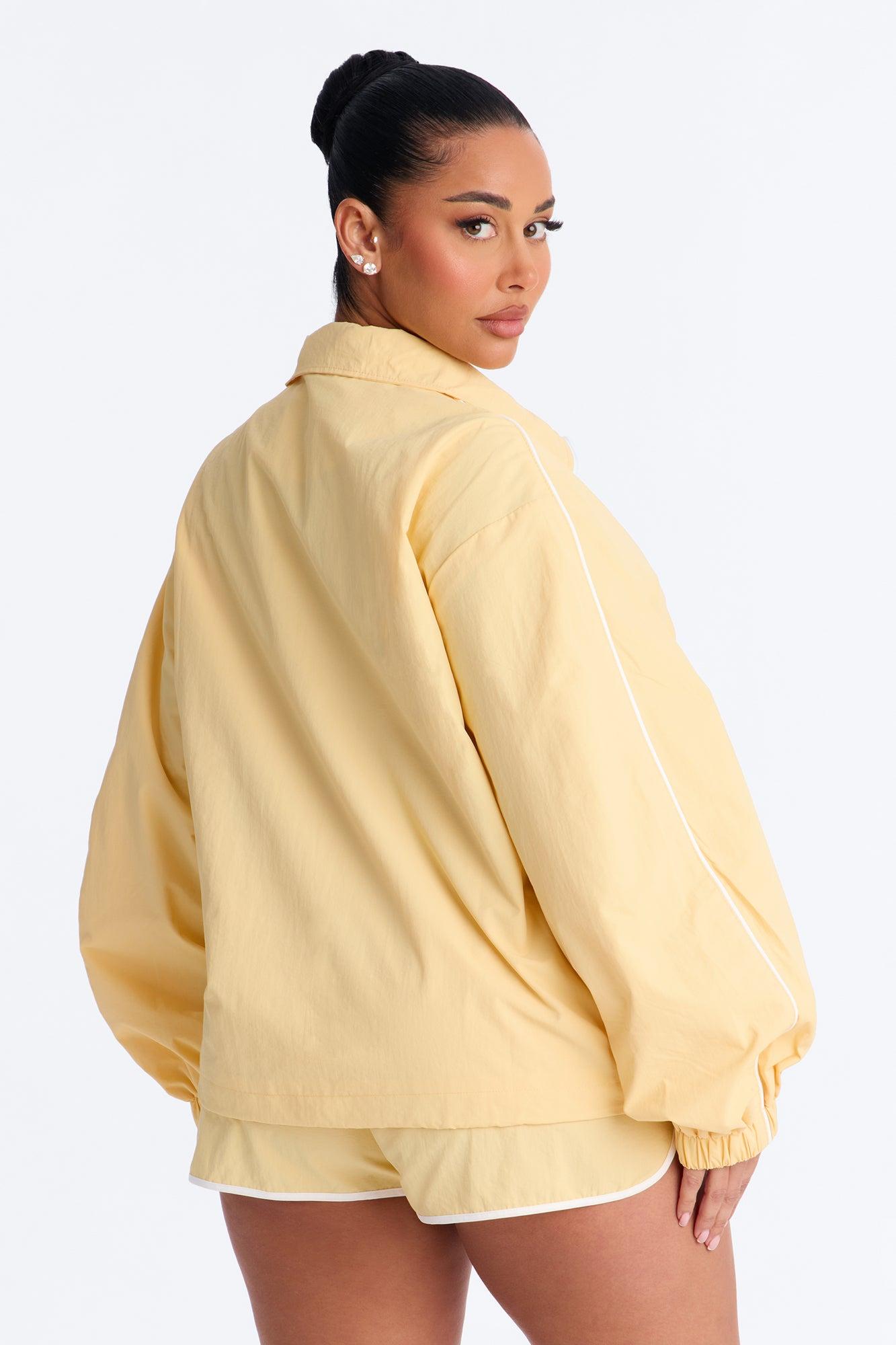 Victory Lap Windbreaker Funnel Neck Half Zip Jacket - Yellow Female Product Image