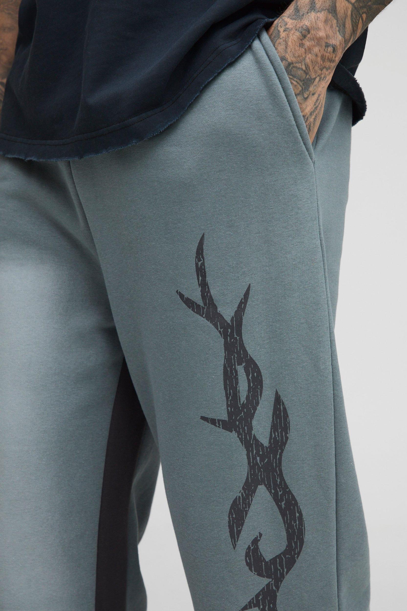 Tall Relaxed Fit Flare Spray Wash Graphic Sweatpants | boohooMAN USA Product Image