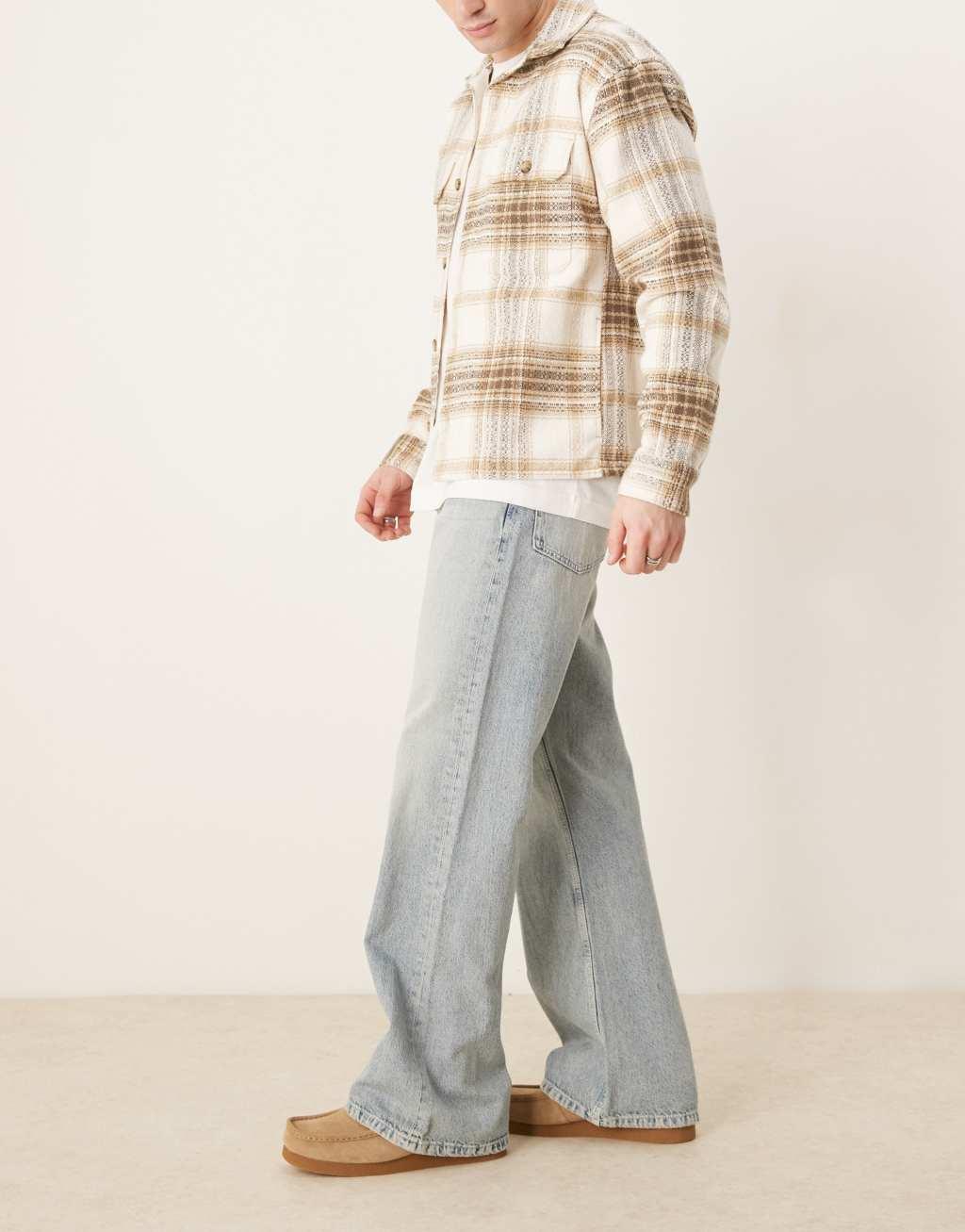 ASOS DESIGN wide flare jeans in bleached wash Product Image
