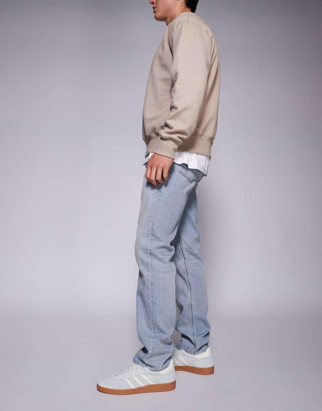 ASOS DESIGN straight leg jeans in light wash blue Product Image