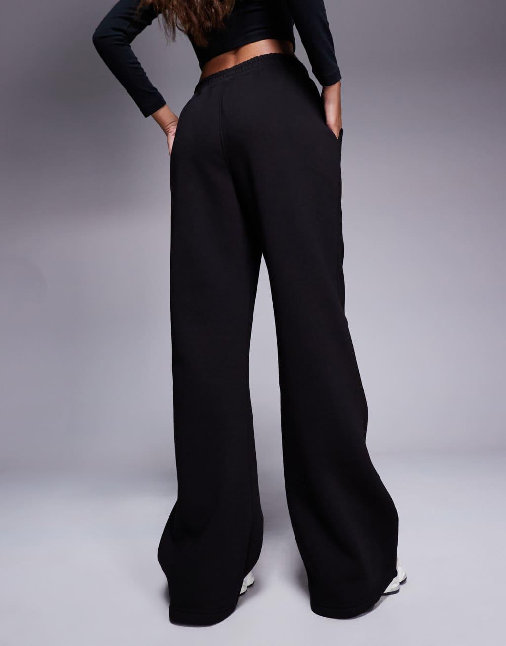 Kaiia Petite embroidered logo wide leg sweatpants in black Product Image