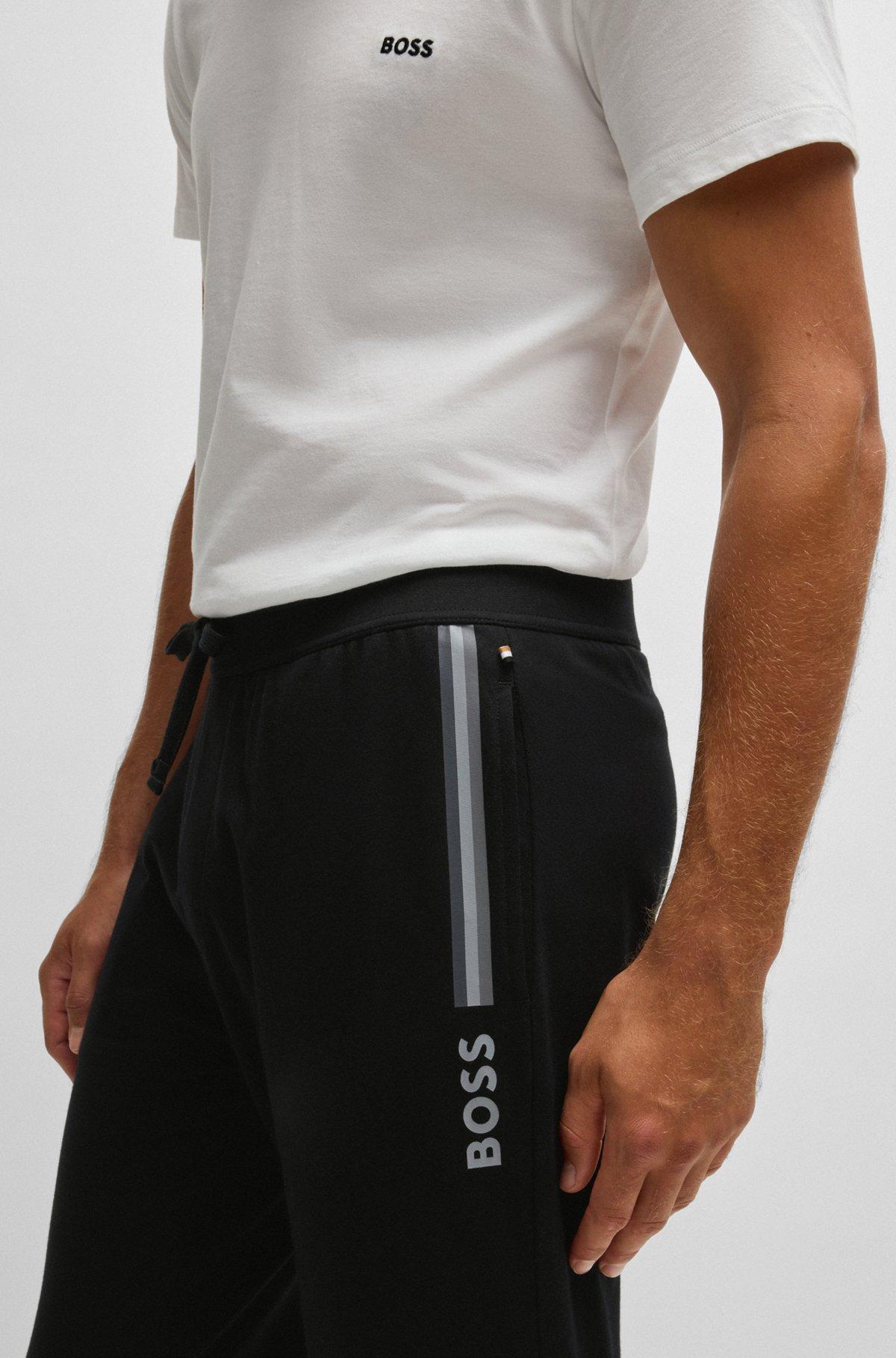 Drawcord tracksuit bottoms in cotton terry with logo print Product Image