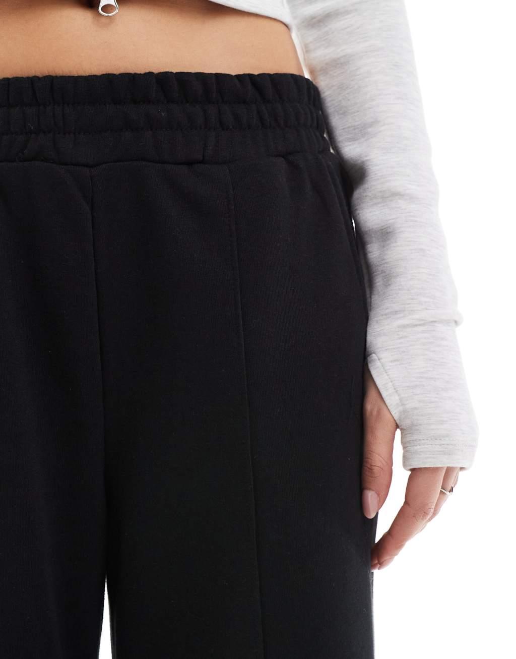 Bershka wide leg sweatpants in black Product Image