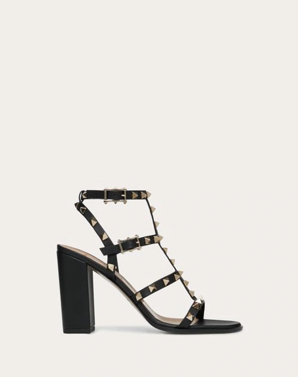 VALENTINO GARAVANI Valentino Rockstud Caged 90 Leather Ankle Strap Sandal In Black Product Image