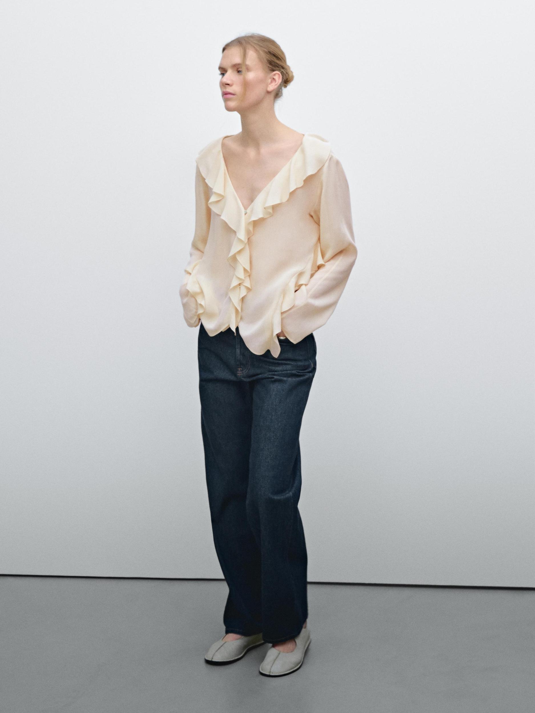 Ruffled blouse with asymmetric hem Product Image