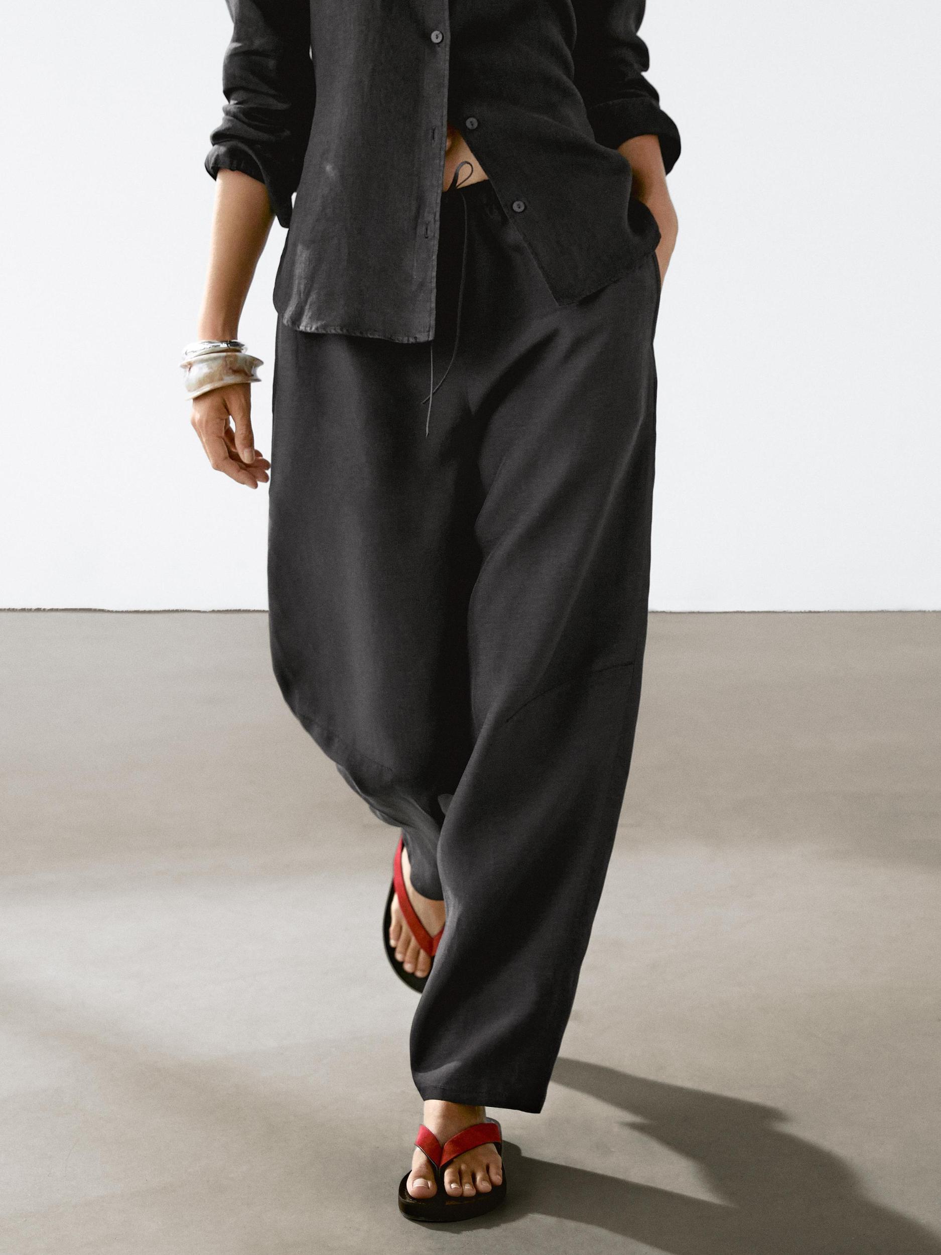 Flowing linen blend barrel fit trousers Product Image