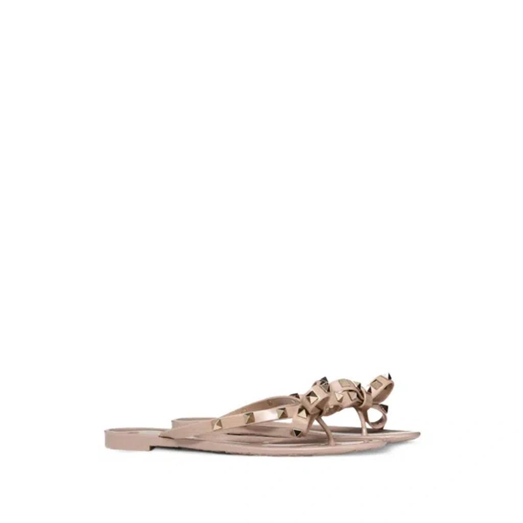 VALENTINO GARAVANI Women Rockstud Rubber Flip Flops In Beige Product Image
