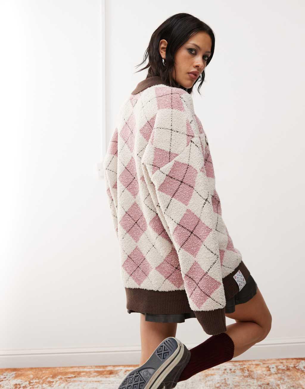 Aape By A Bathing Ape argyle knitted logo polo sweater in pink/brown Product Image