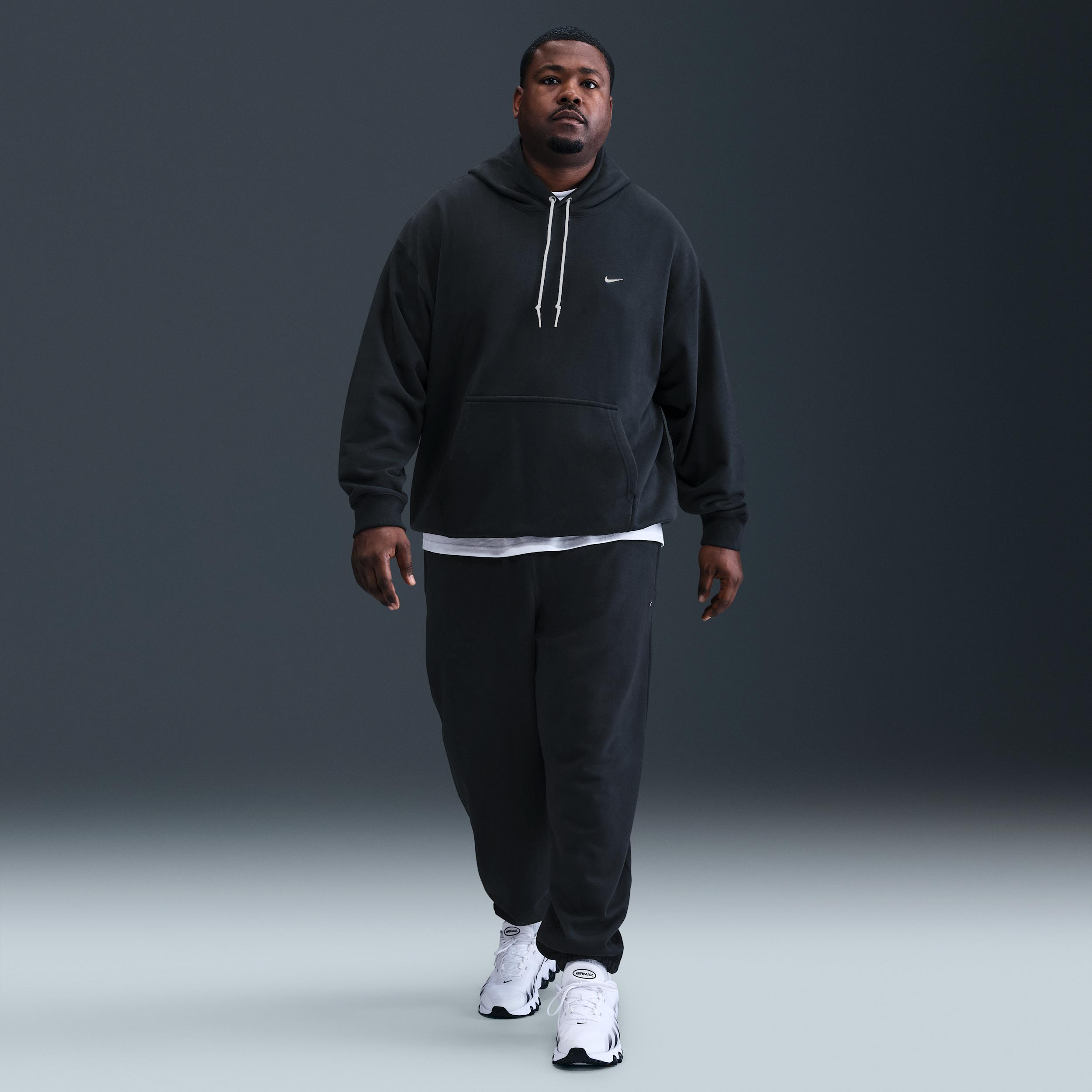 Nike Mens Solo Swoosh Cuffed Fleece Pants | HV1088-010 Product Image