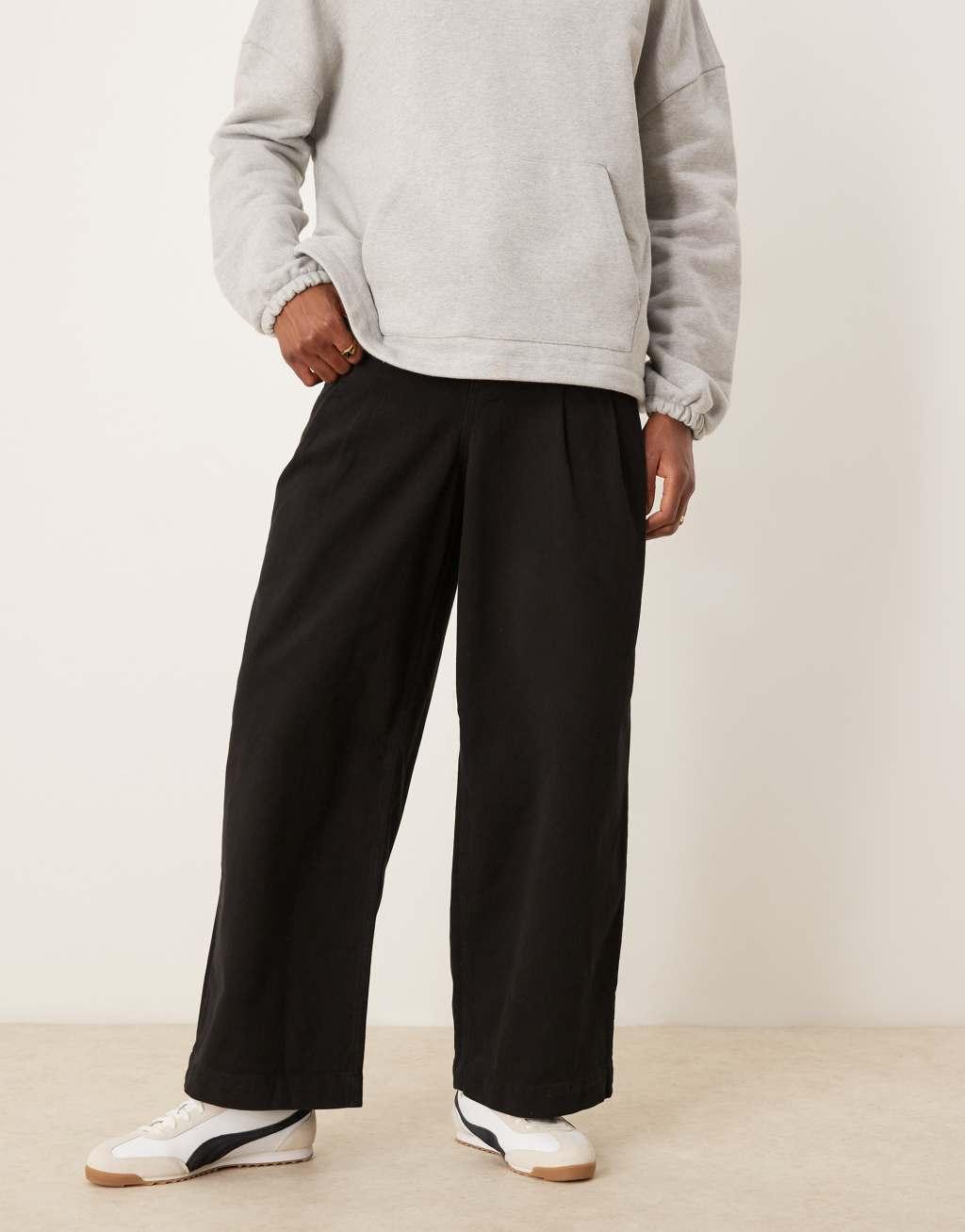 ASOS DESIGN super baggy pleated pants in black Product Image