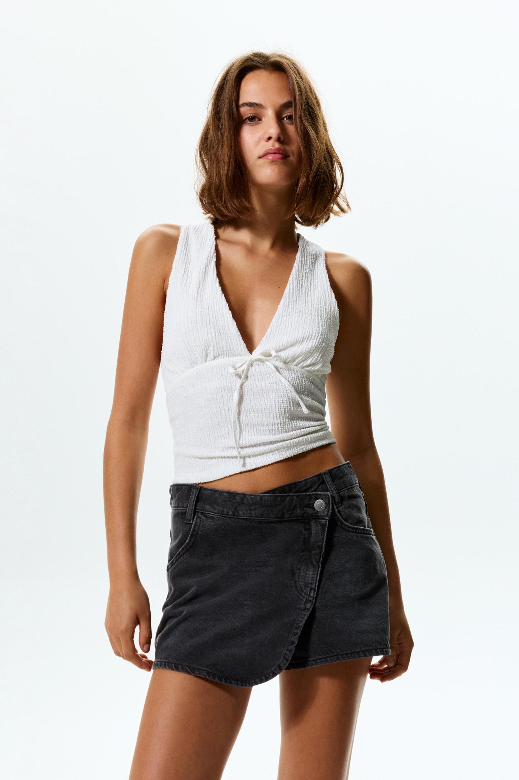 Crossover denim mini skirt Product Image