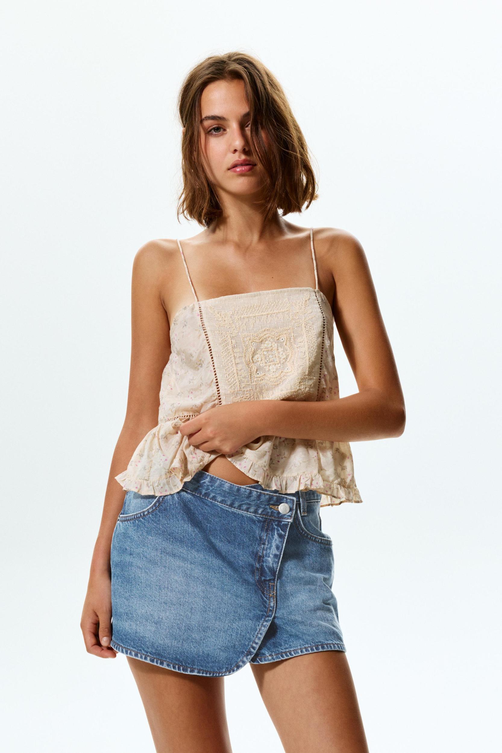 Crossover denim mini skirt Product Image