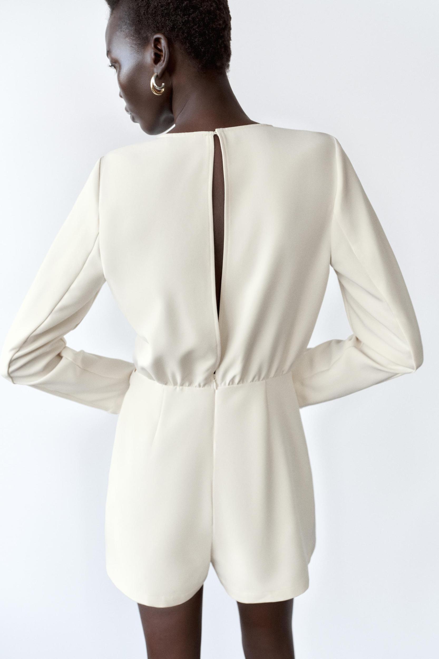 GOLD CHAIN CREPE JUMPSUIT Product Image