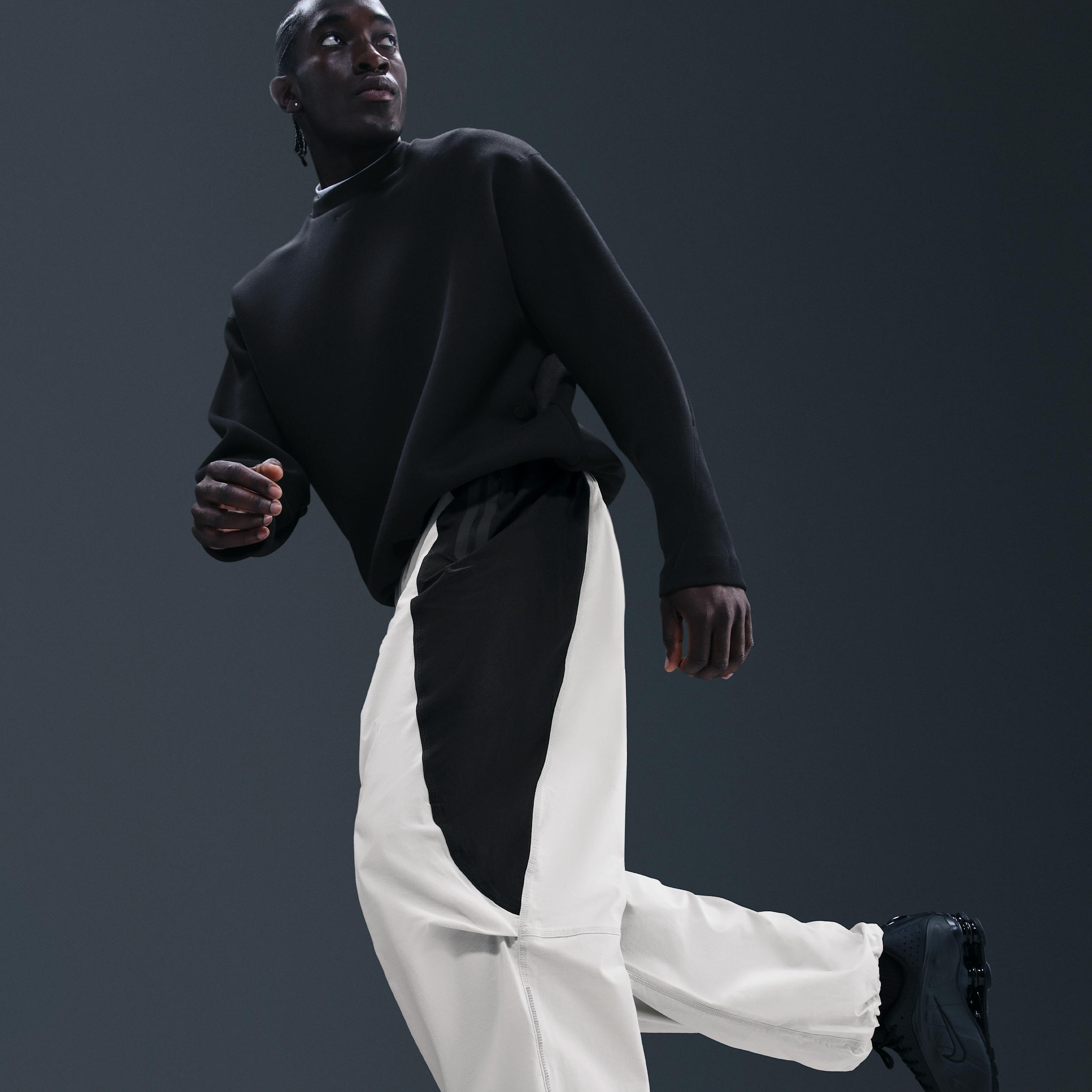 Nike Men's Tech Dri-FIT Woven Color-Block Oversized Pants Product Image