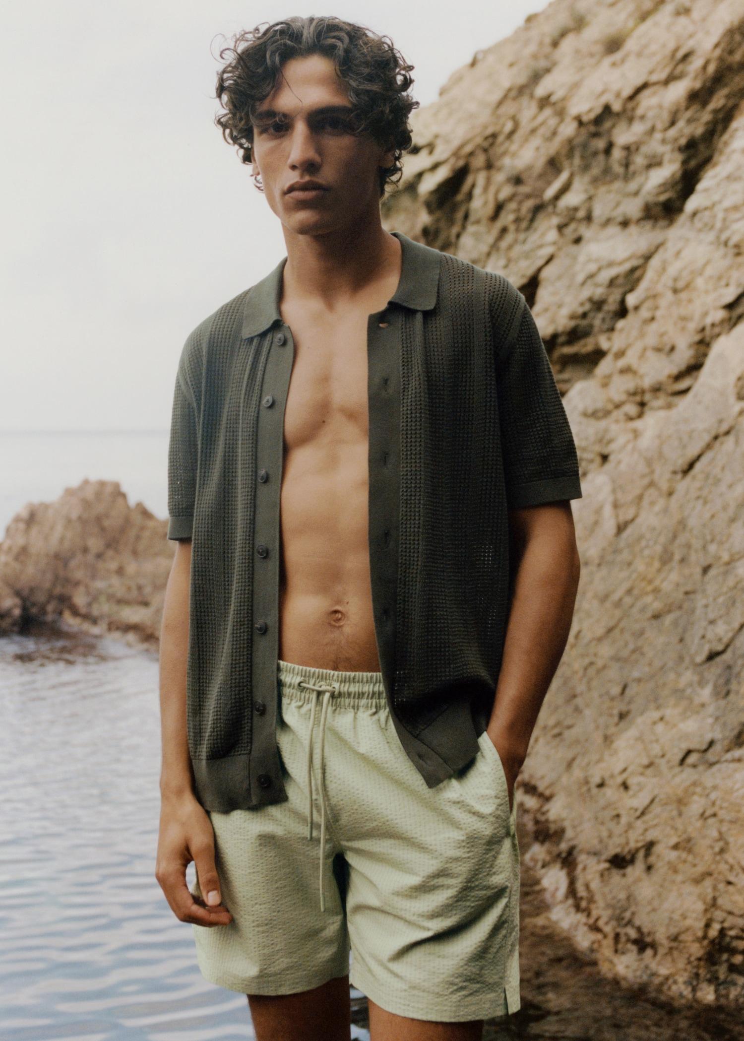 Striped openwork knitted shirt - Men | MANGO USA Product Image