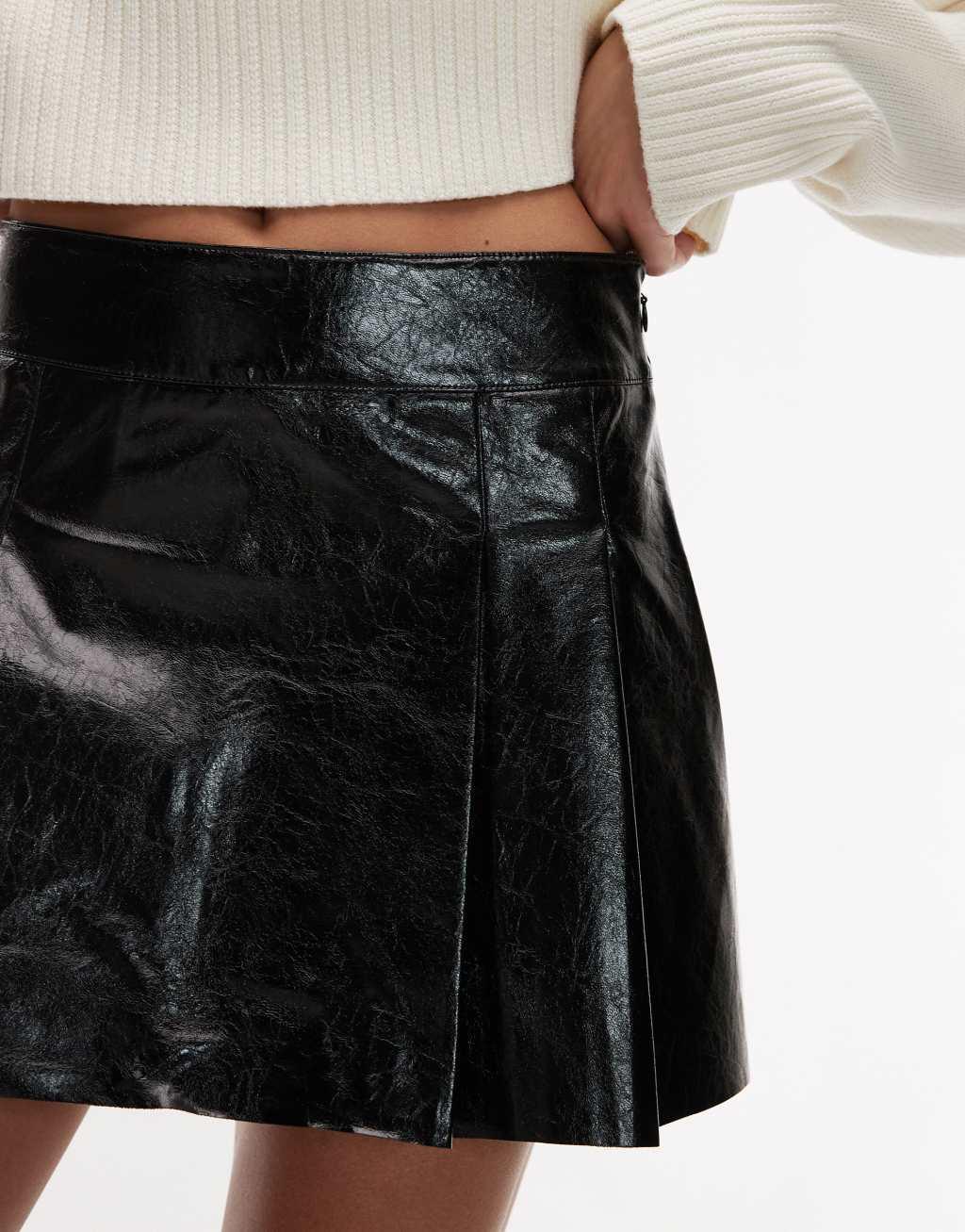 Mango mini leather look pleated skirt in black Product Image