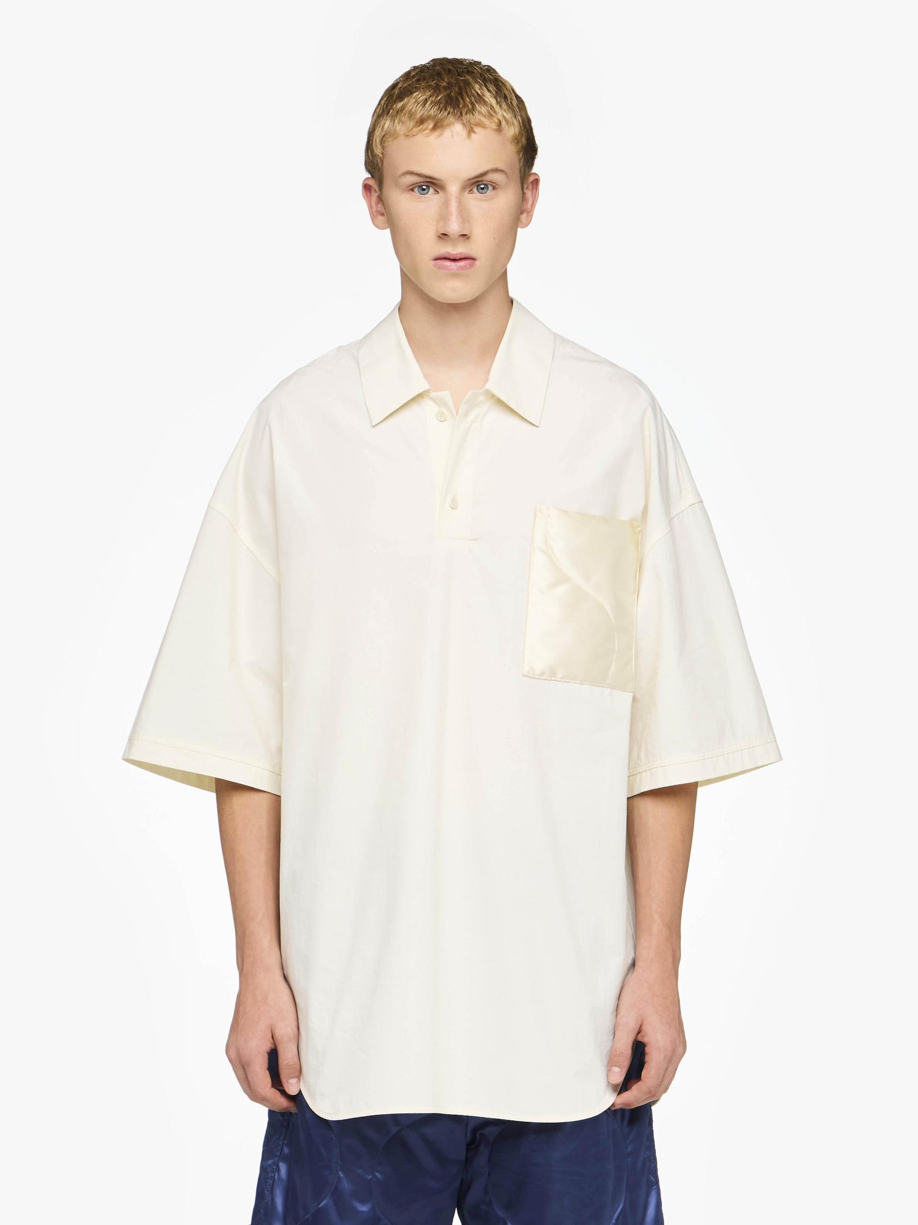 QUILTED POCKET POLO TOP Product Image