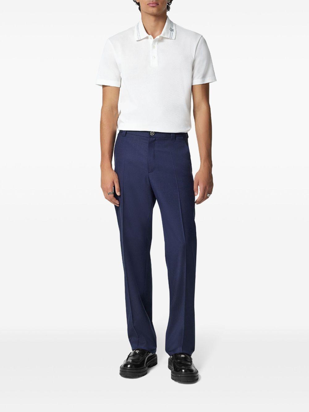 Medusa-embroidered polo shirt  Product Image