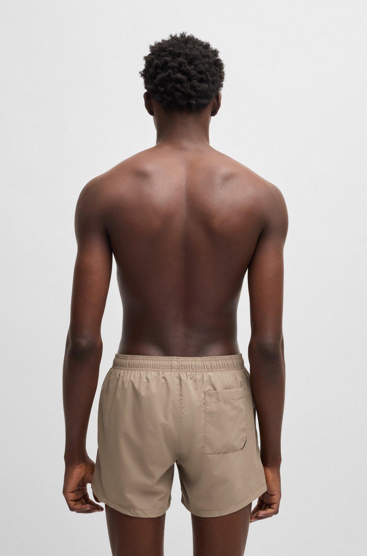 HUGO - Quick-dry swim shorts with vertical logo print - Light Blue Product Image