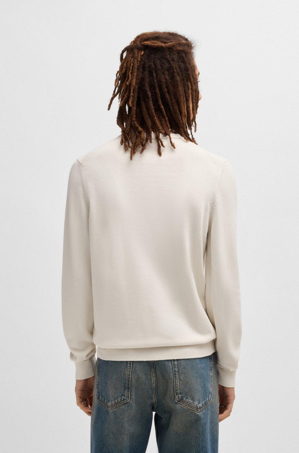 Cotton sweater with red logo label Product Image