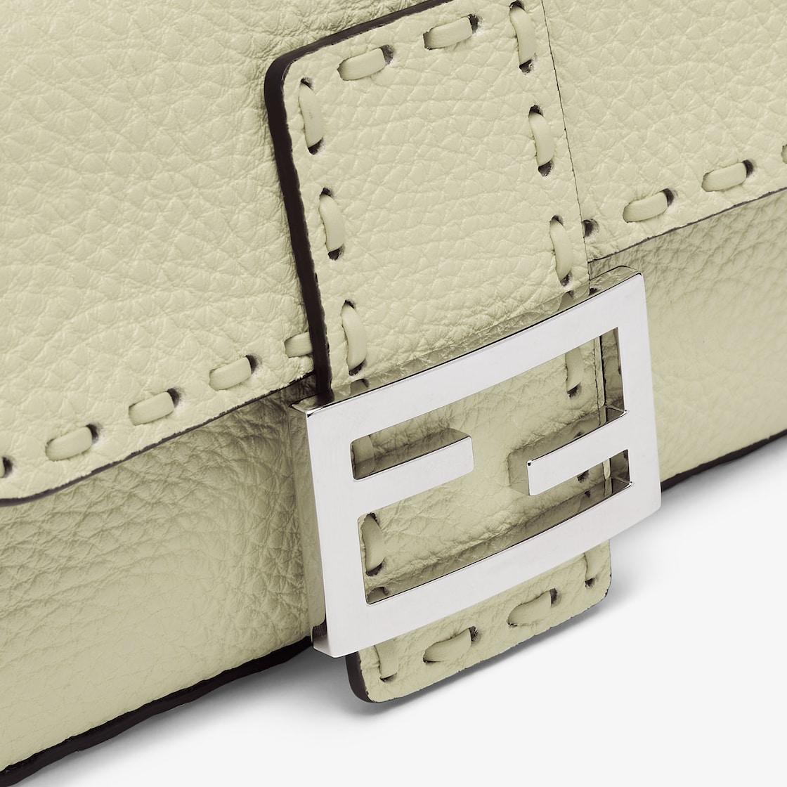 Baguette MiniSage green Selleria bag with 309 hand-sewn topstitches Product Image