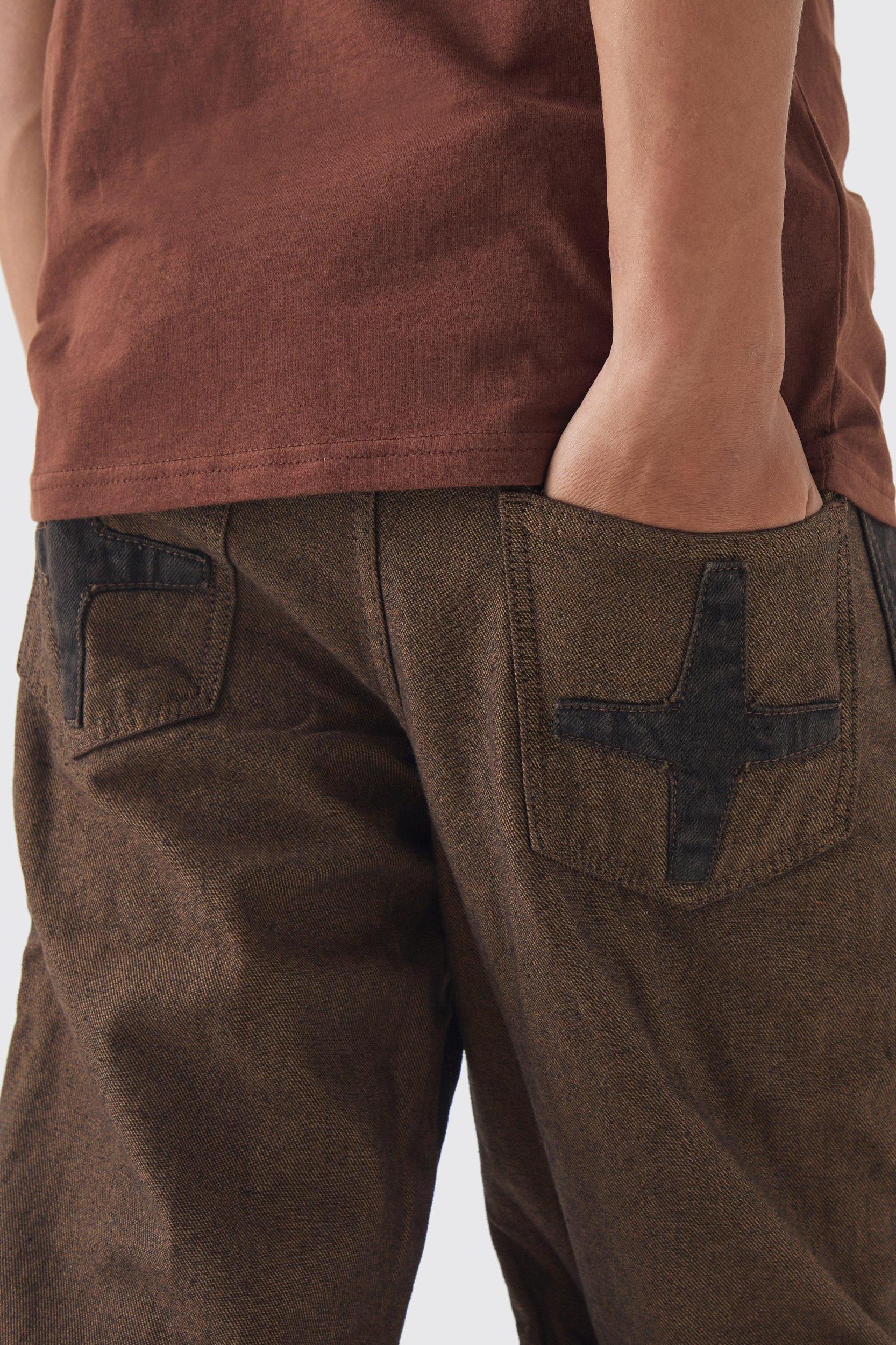 Relaxed Fit Cut Out Star Jeans | boohooMAN USA Product Image