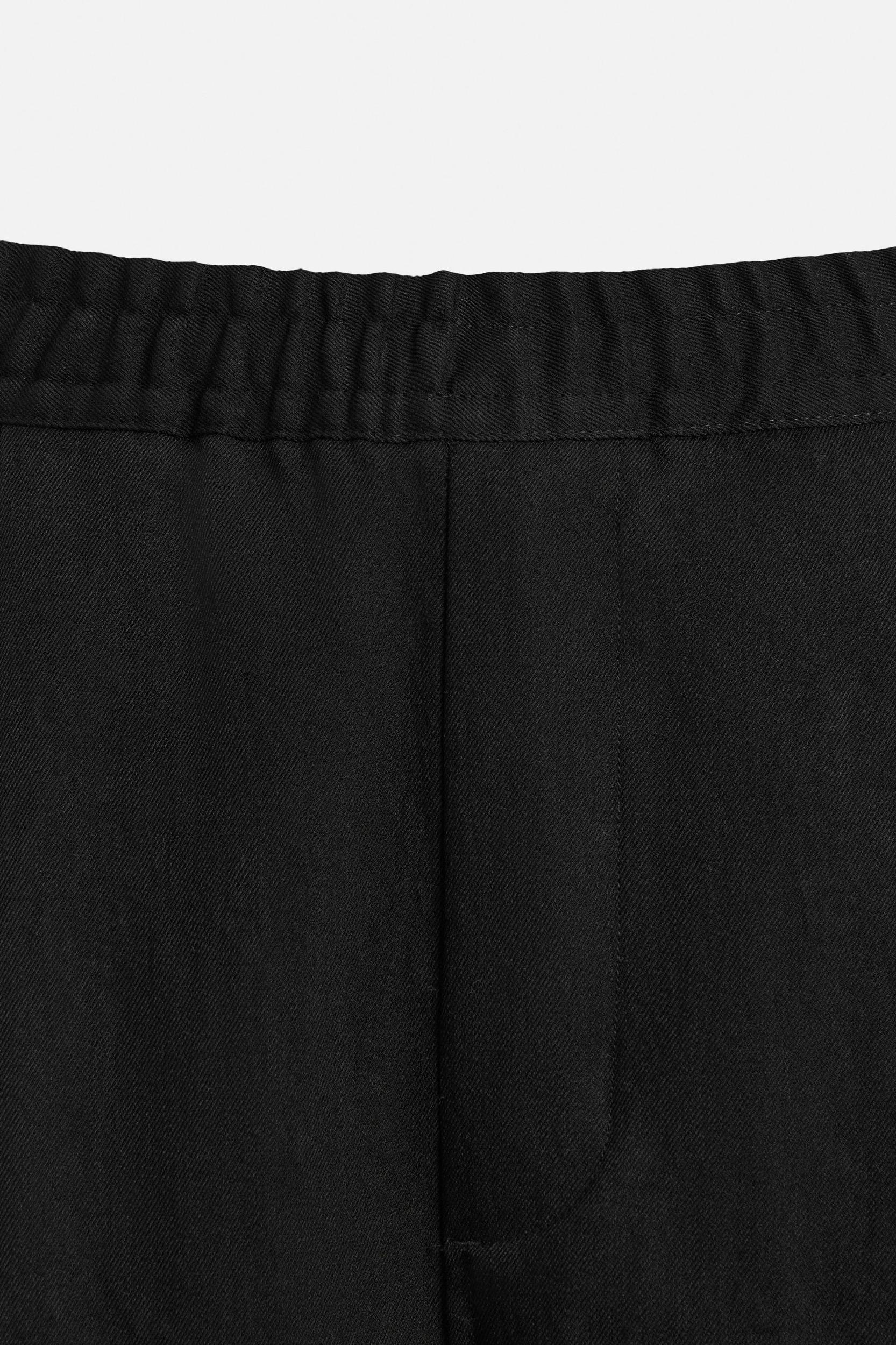 FLOWY PLEATED PANTS Product Image