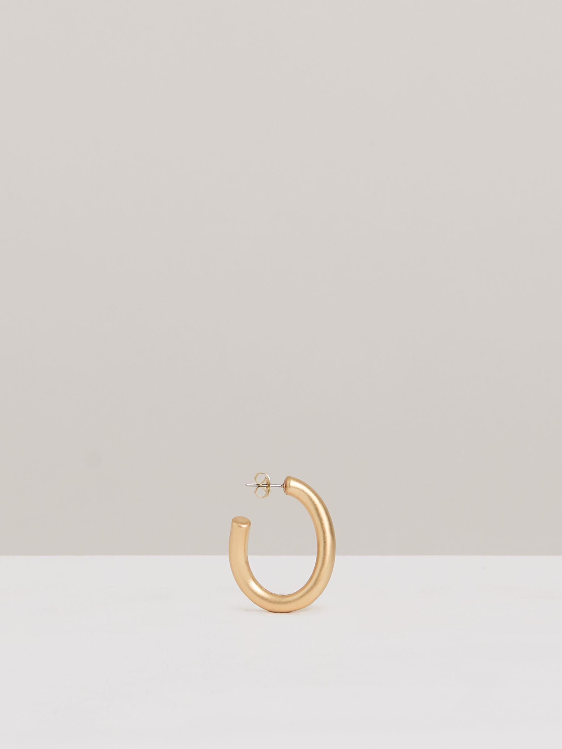 Wave Hoop Earrings in Gold Tone Product Image