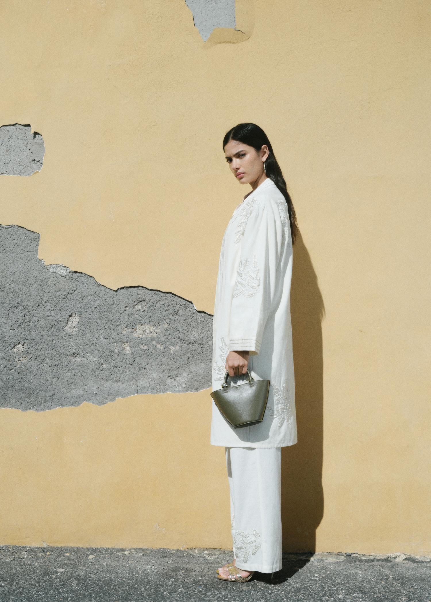 Embroidered straight-fit pants - Women | MANGO USA Product Image