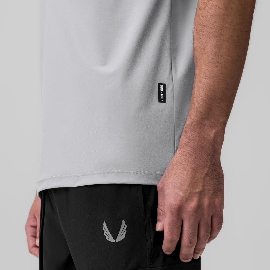 1087. Tetra-Lite® Ice Zip Tee - Light Sky Product Image