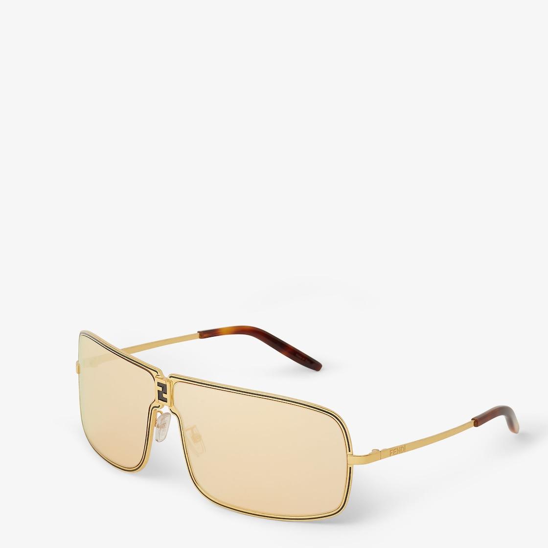 FendinessGold metal sunglasses with orange lenses with gold flash Product Image