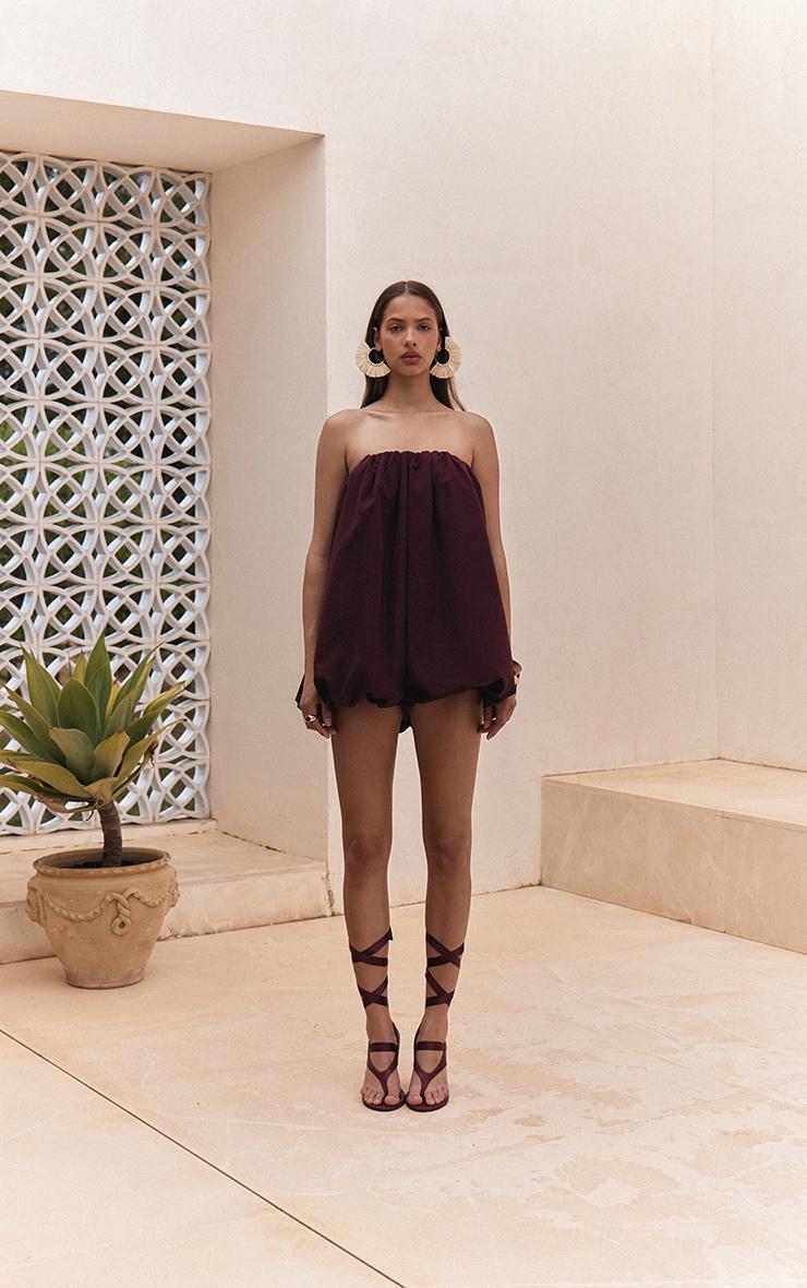 Dark Plum Puffball Romper Product Image